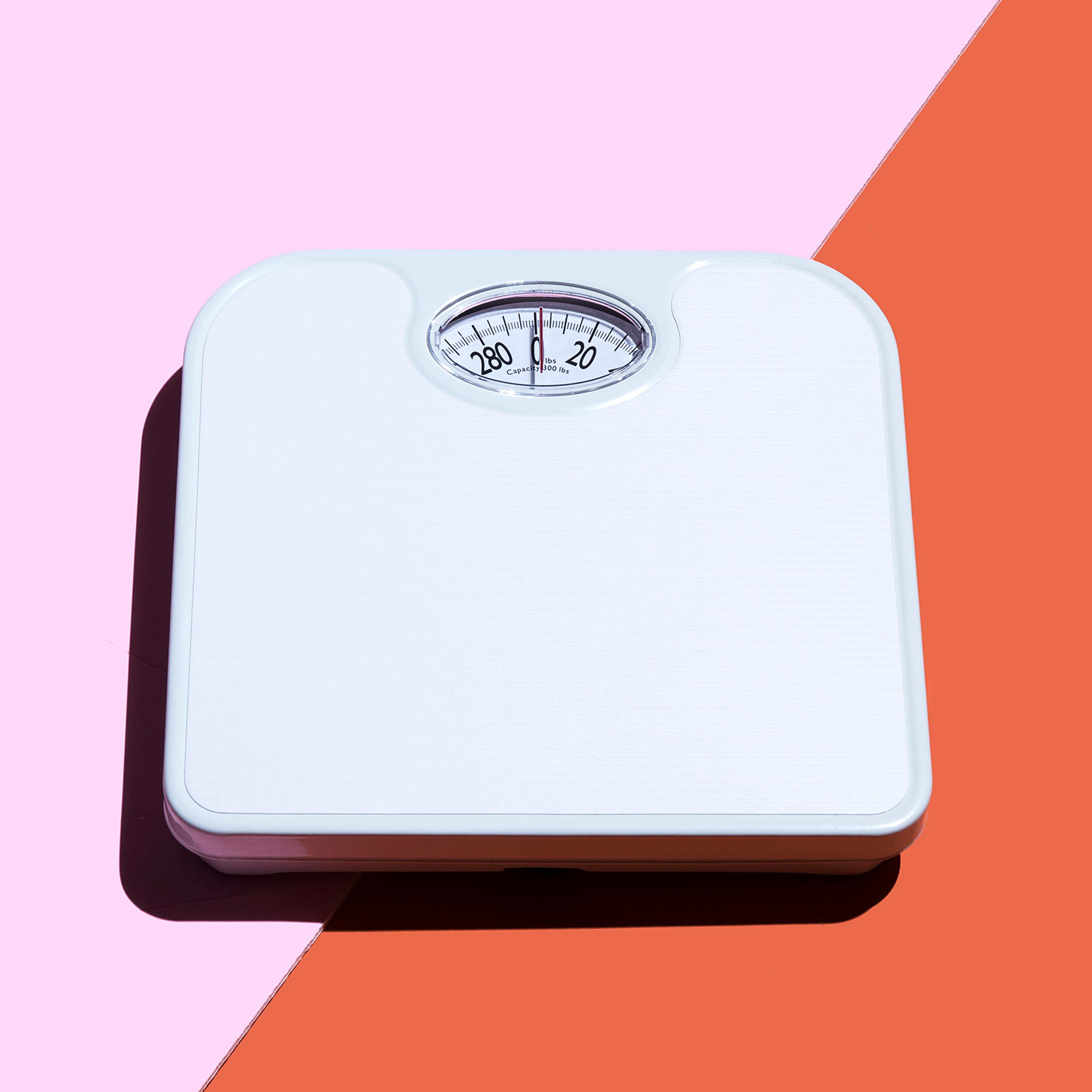 scale-2-weight-body-image-diet-health-fitness-advice-betterment-motto-stock
