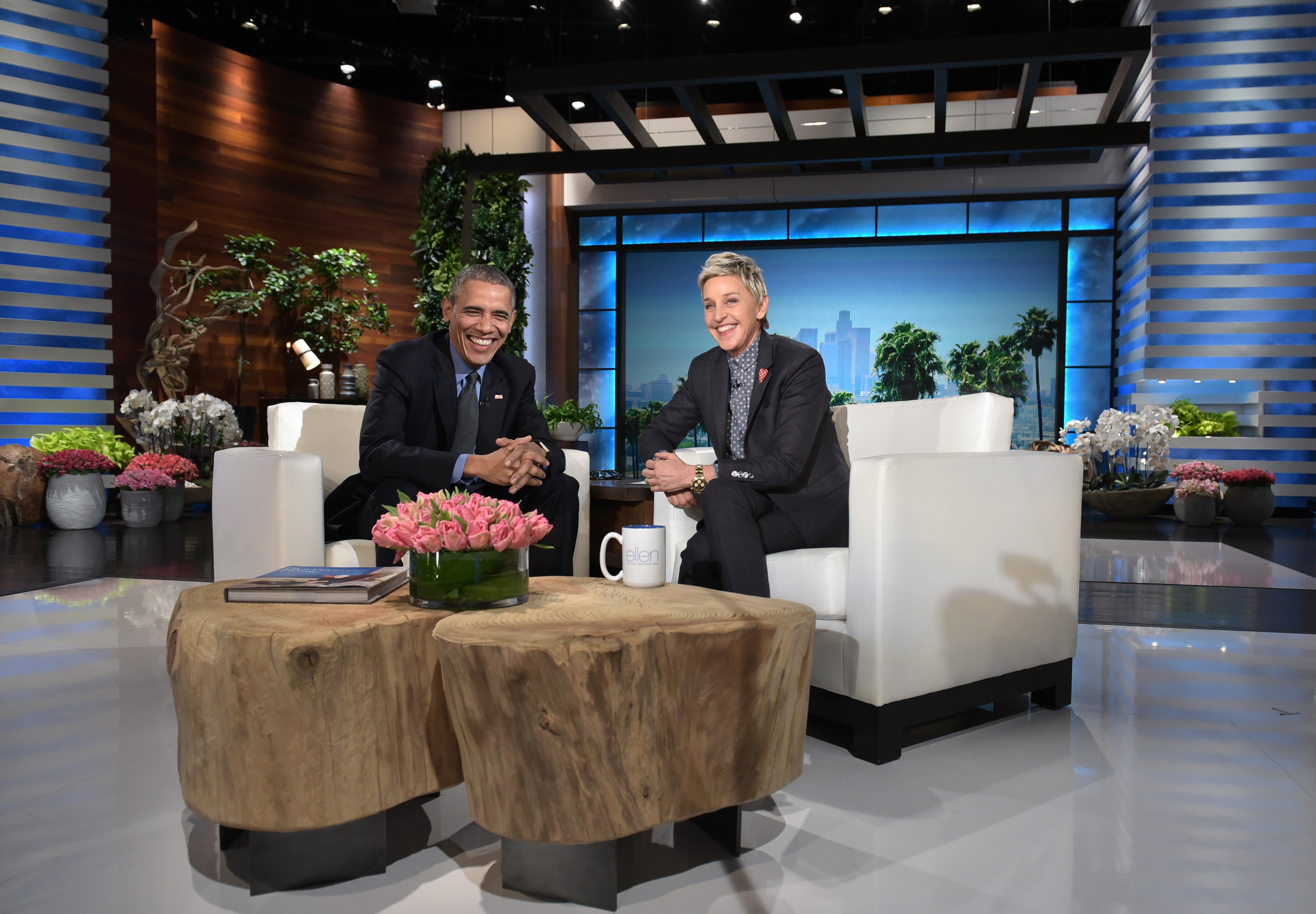 US President Barack Obama and talk show host Ellen DeGeneres are seen during a break in the taping of The Ellen DeGeneres show at Warner Brothers Studios in Burbank, Calif. on Feb. 11, 2016.
