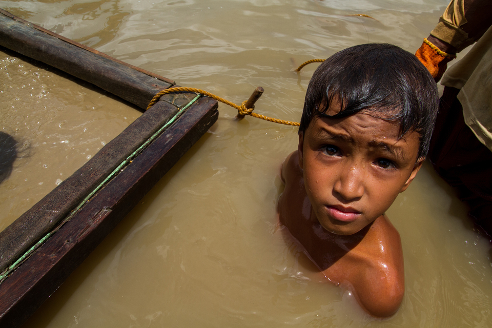 An 11-year-old boy works at an underwater mining site in Camarines Norte province, Philippines.
