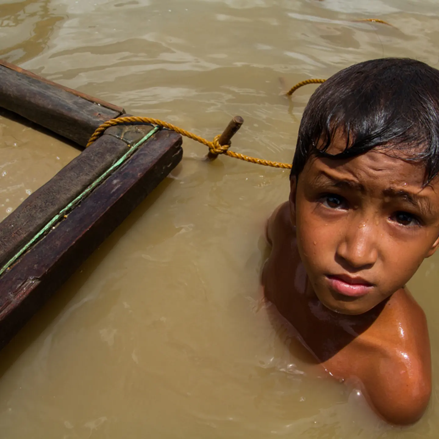 An 11-year-old boy works at an underwater mining site in Camarines Norte province, Philippines.