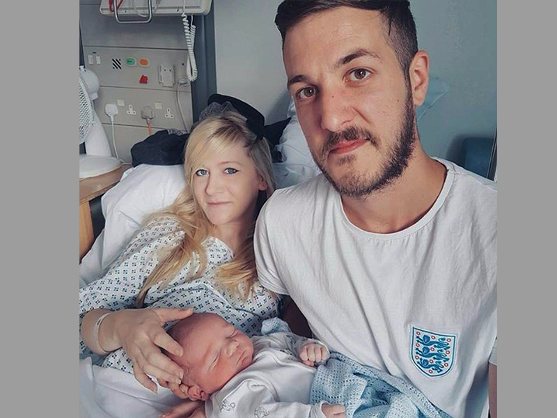 This is an undated hand out photo of Chris Gard and Connie Yates with their son Charlie Gard provided by the family, at Great Ormond Street Hospital, in London.