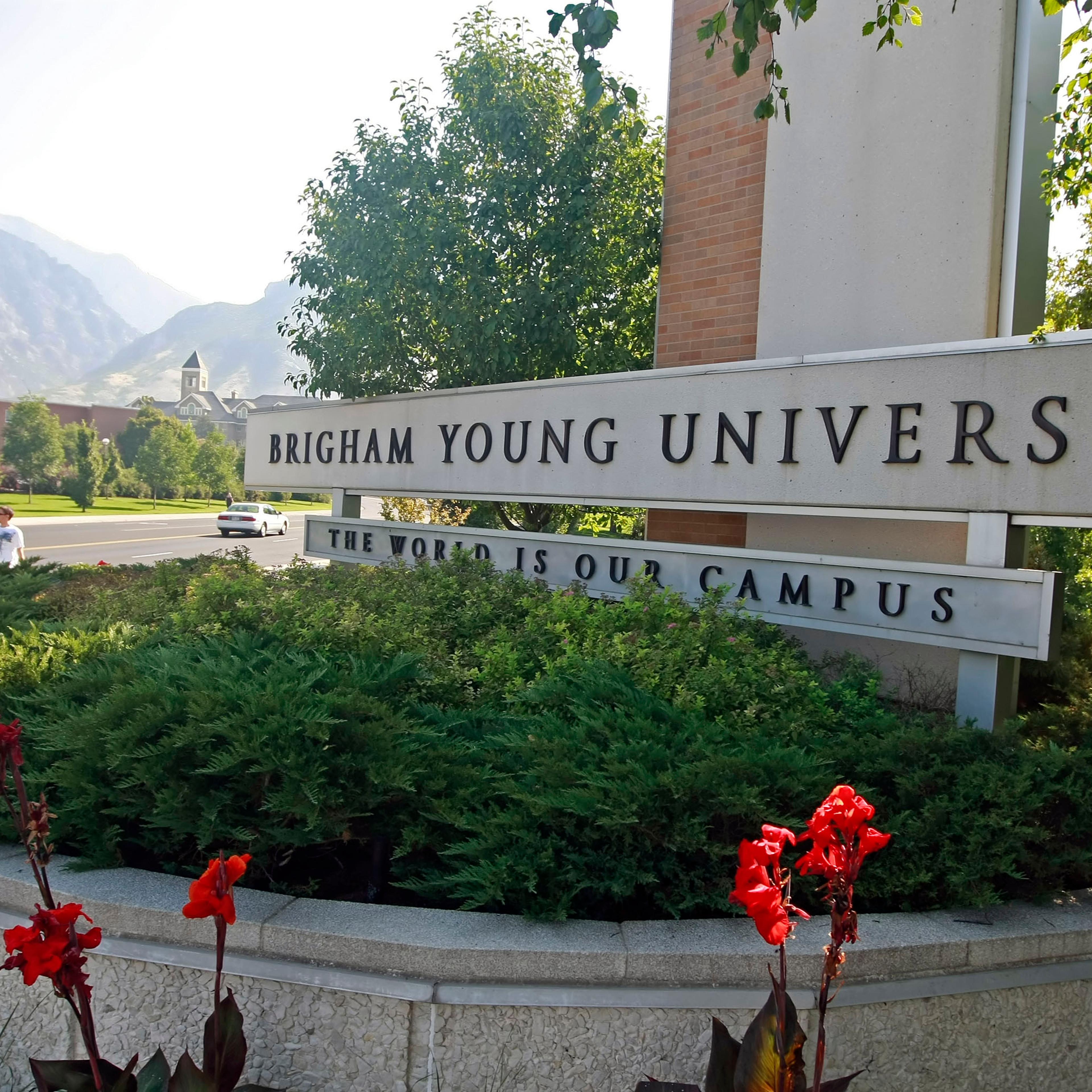 A sign stands at the main entrance to the campus of Brigham