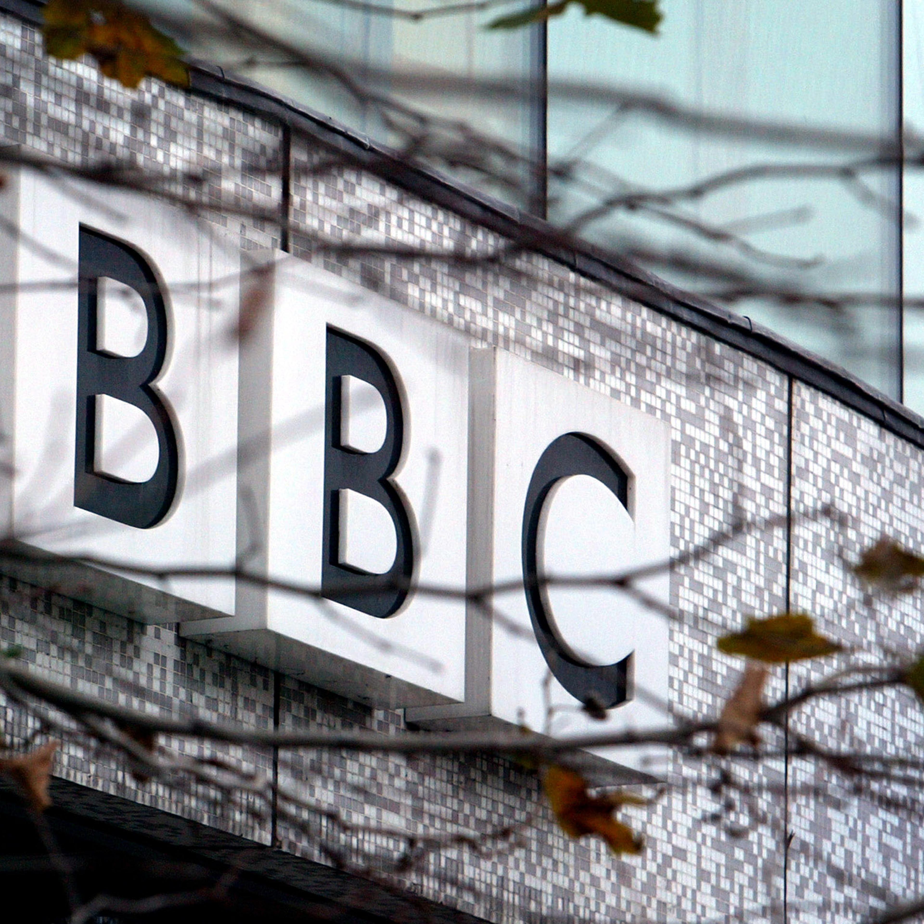 A BBC logo is seen at the company's main offices, in west London, on the day the organisation announ..