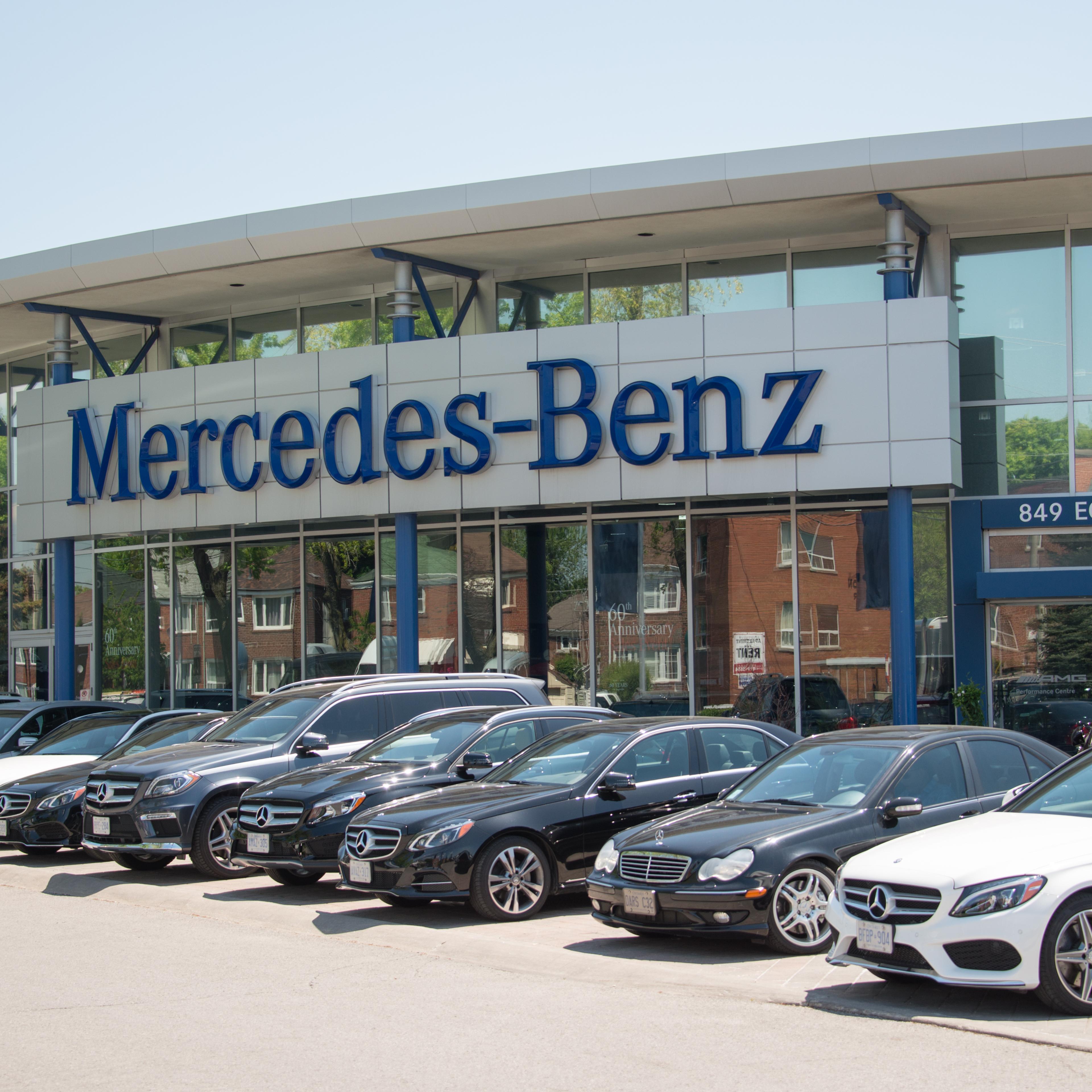 Mercedes Benz dealer in a city, outdoor display of the