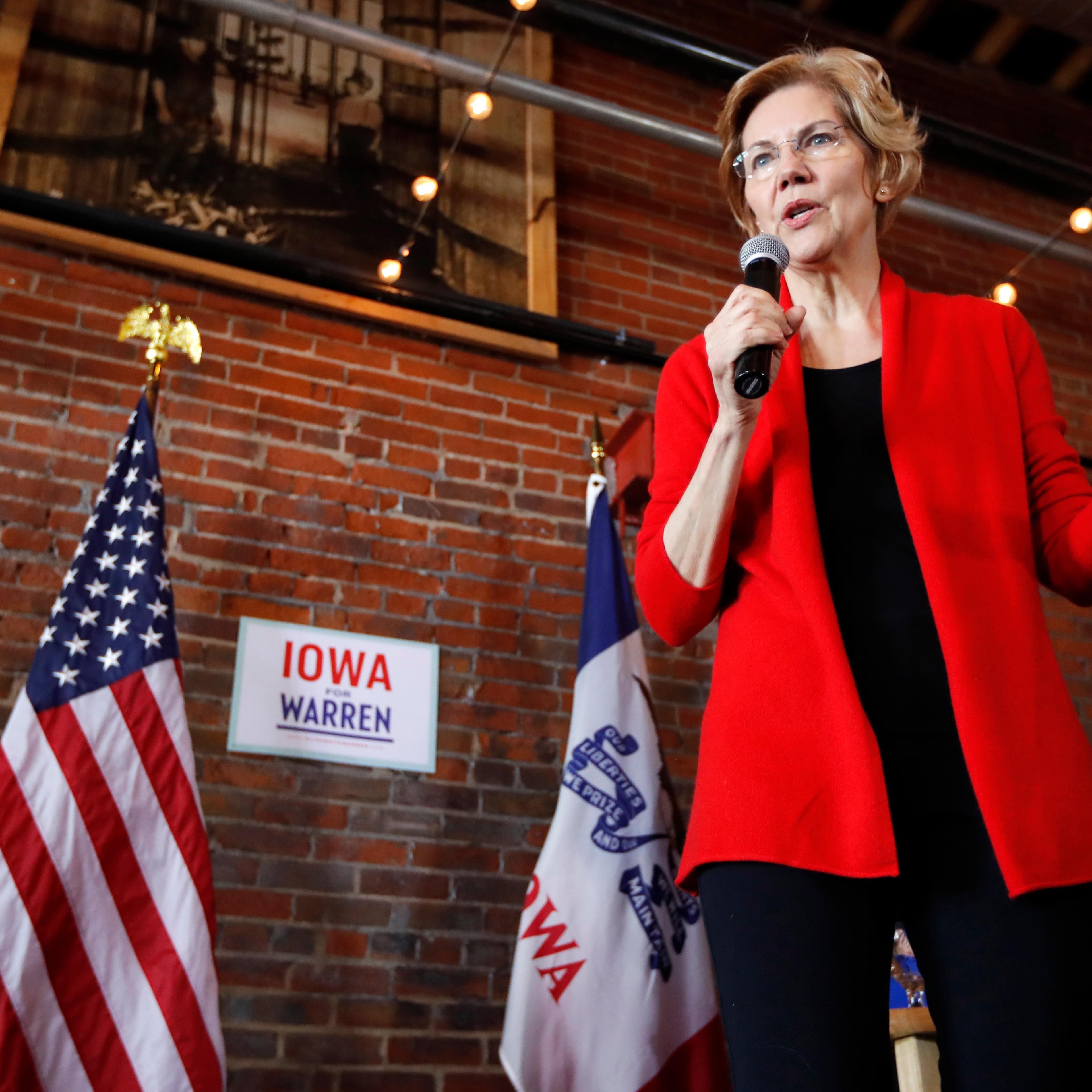 Democratic presidential candidate Sen. Elizabeth Warren speaks to local residents during an organizing event