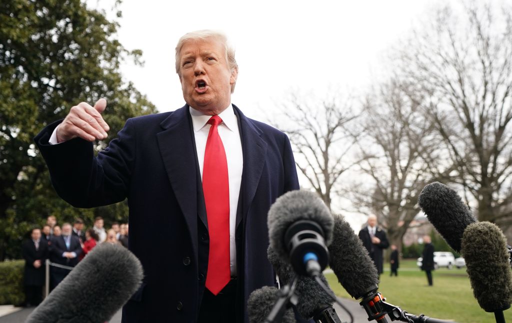 US President Donald Trump speaks to the press before boarding Marine One as he departs from the White House