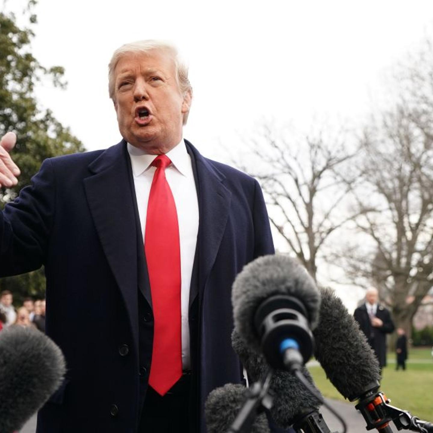 US President Donald Trump speaks to the press before boarding Marine One as he departs from the White House