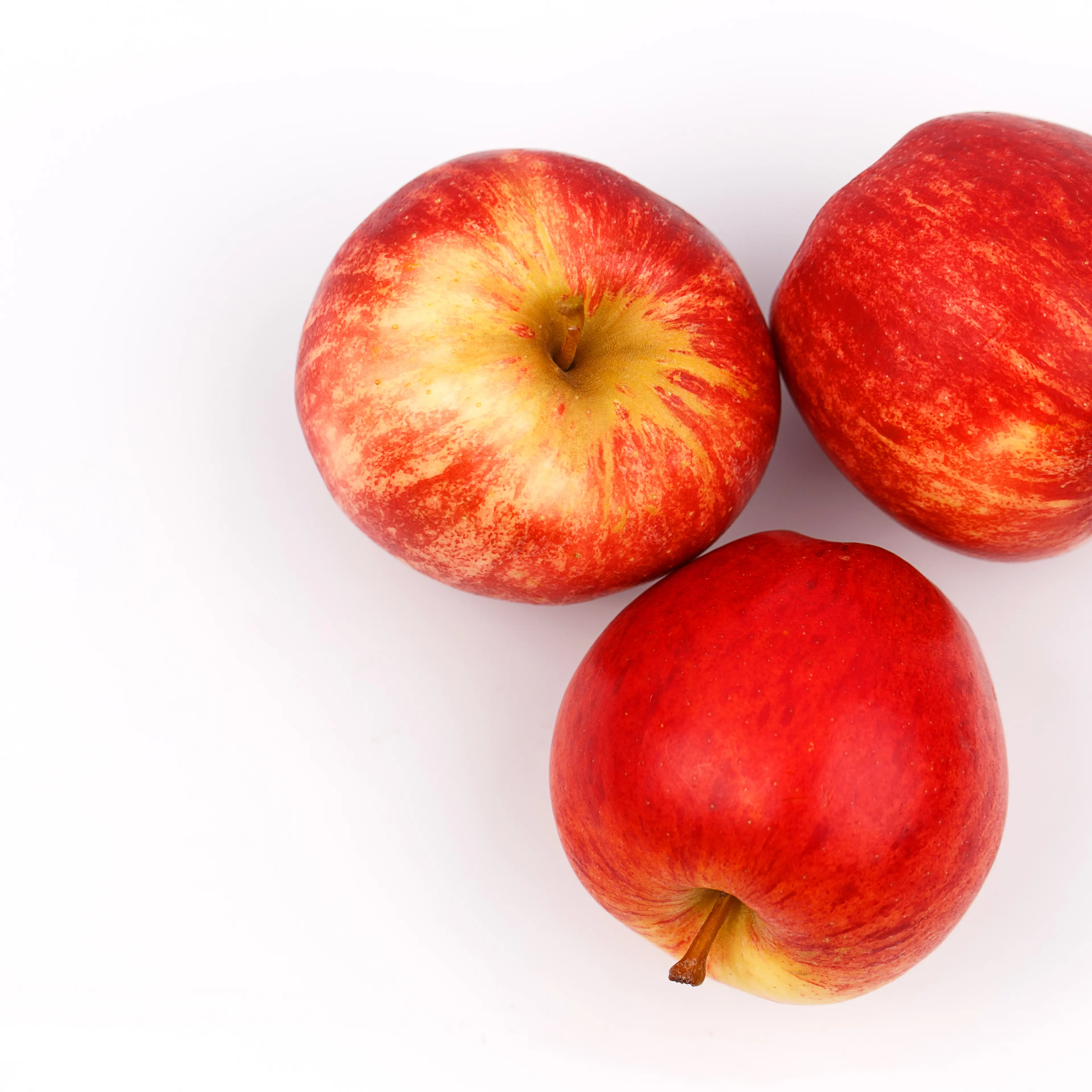 Directly Above Shot Of Apples Over White Background