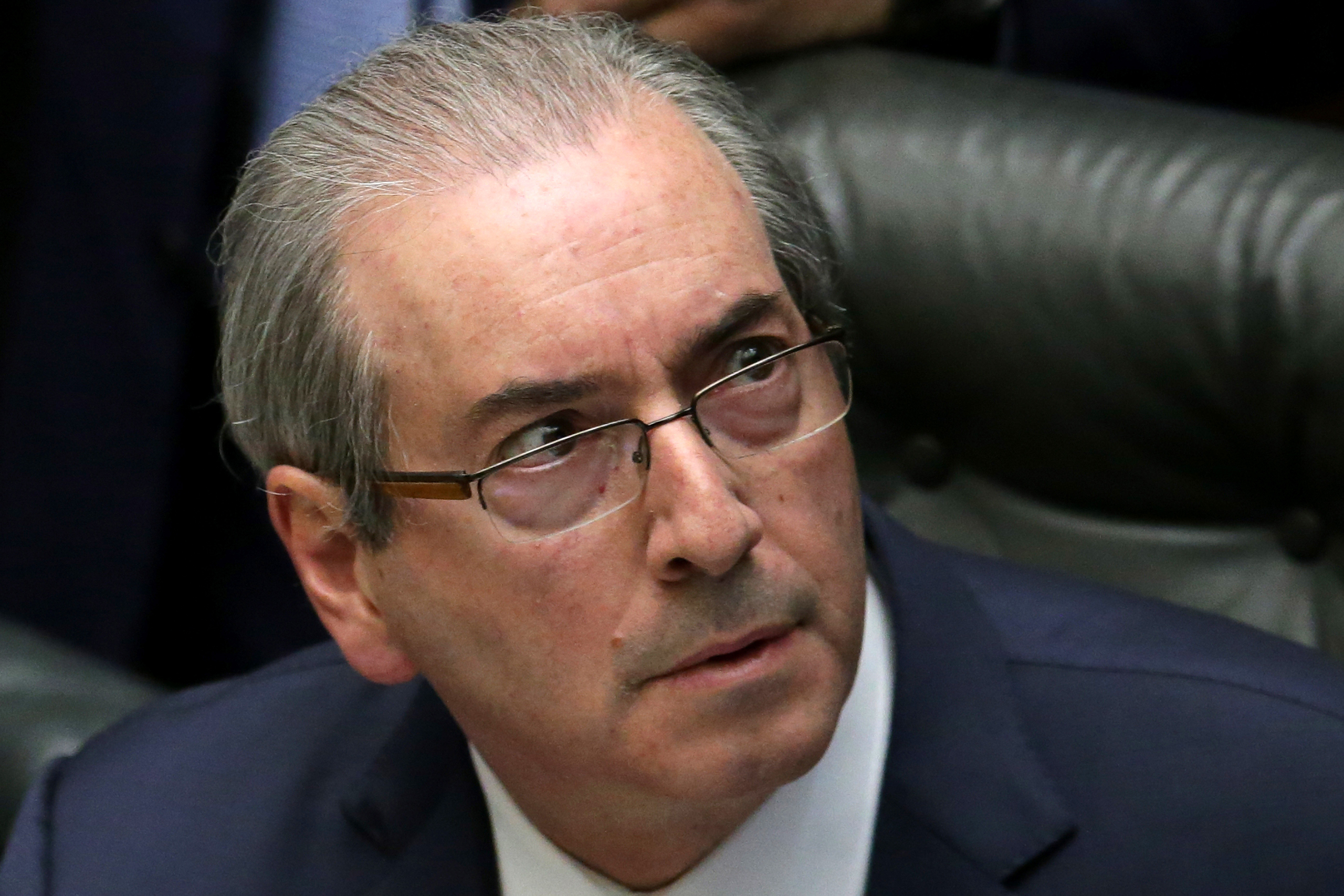 FILE - In this April 15, 2016 file photo, House Speaker Eduardo Cunha attends a debate on whether or not to impeach the president, at the Chamber of Deputies in Brasilia, Brazil. A justice on Brazil’s supreme court suspended Cunha, which temporarily remo
