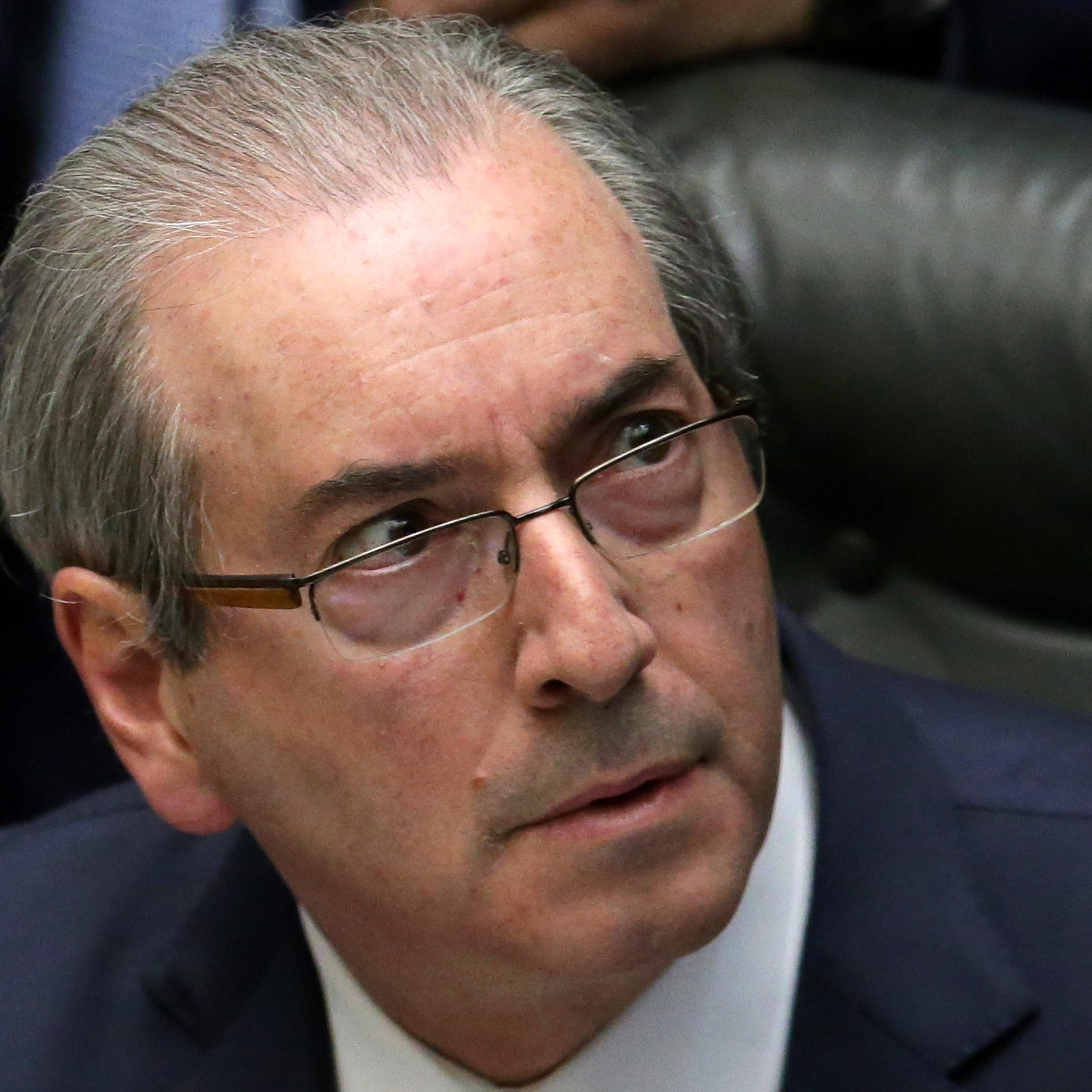 FILE - In this April 15, 2016 file photo, House Speaker Eduardo Cunha attends a debate on whether or not to impeach the president, at the Chamber of Deputies in Brasilia, Brazil. A justice on Brazil’s supreme court suspended Cunha, which temporarily remo
