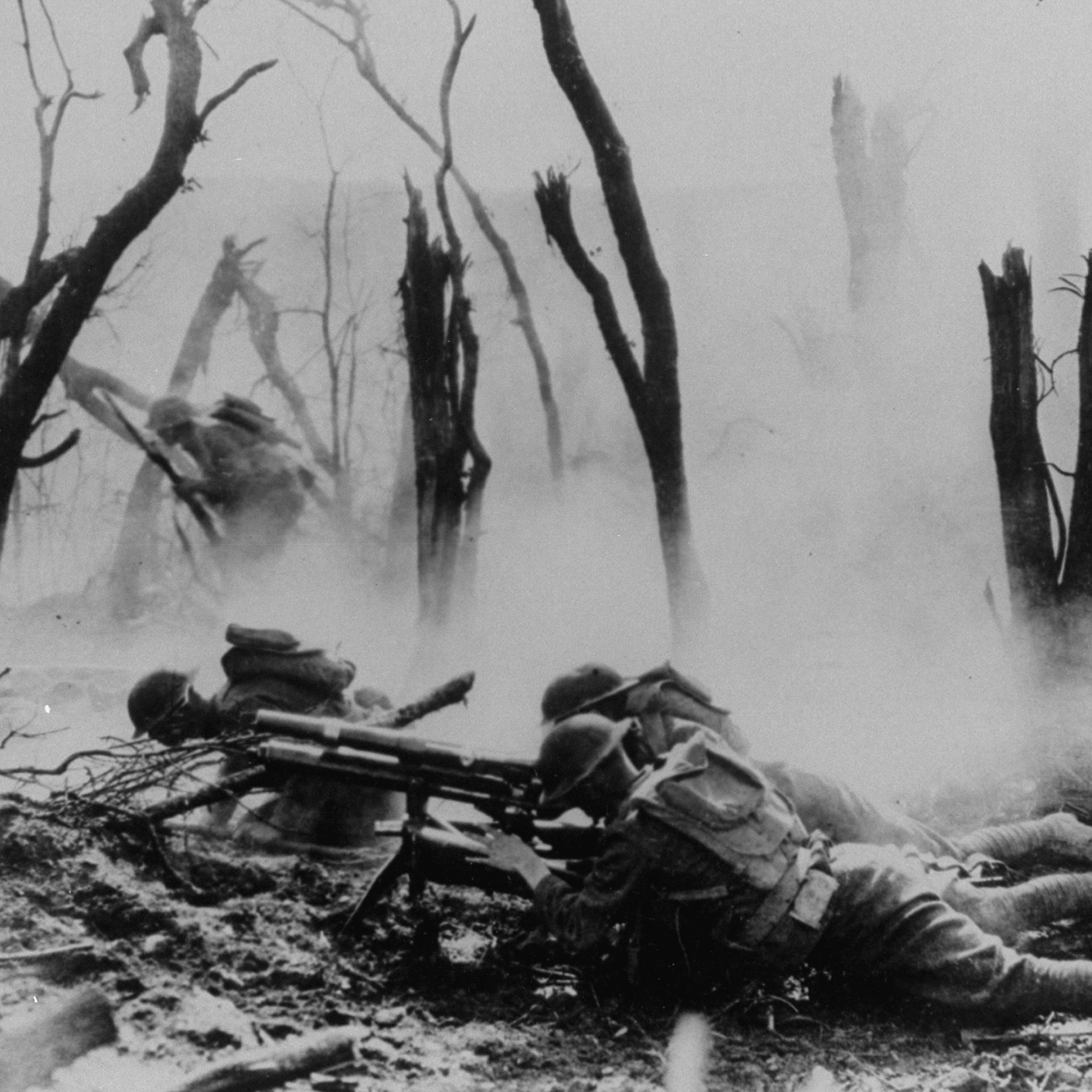 U.S. soldiers of the 23rd Infantry, 2nd Division, firing a 37mm machine gun at a German position in the Argonne Forest, during the Meuse-Argonne offensive in 1918.