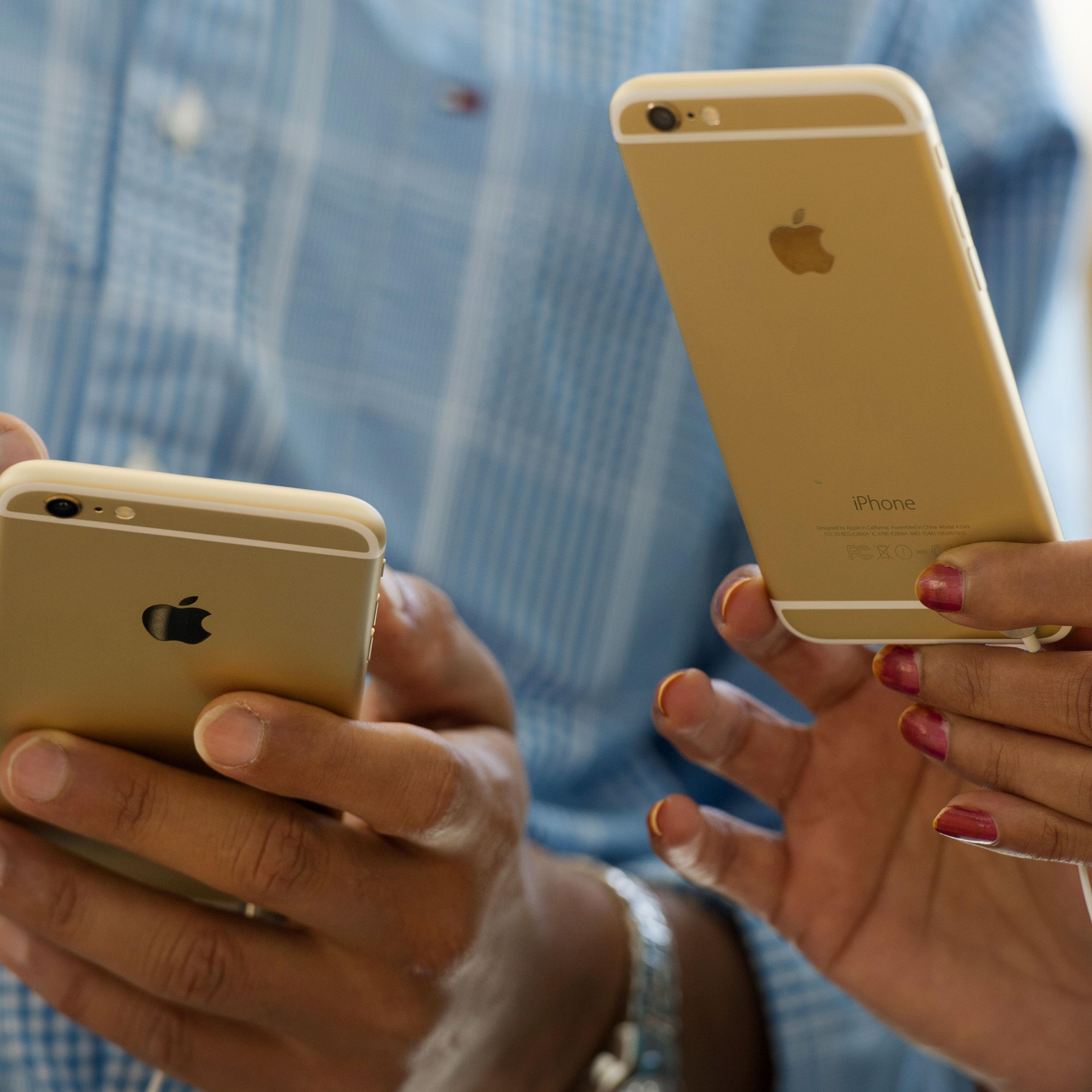 Apple's New Big-Screen iPhones Draw Long Lines As Sales Start