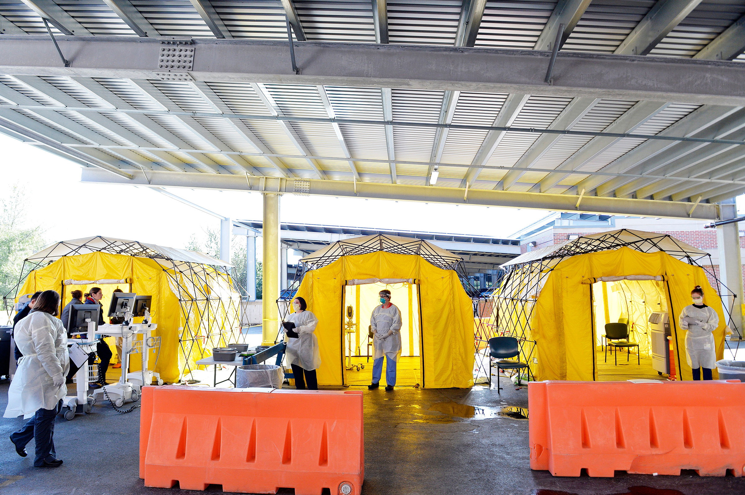 Hospital clinicians work to test patients for the coronavirus