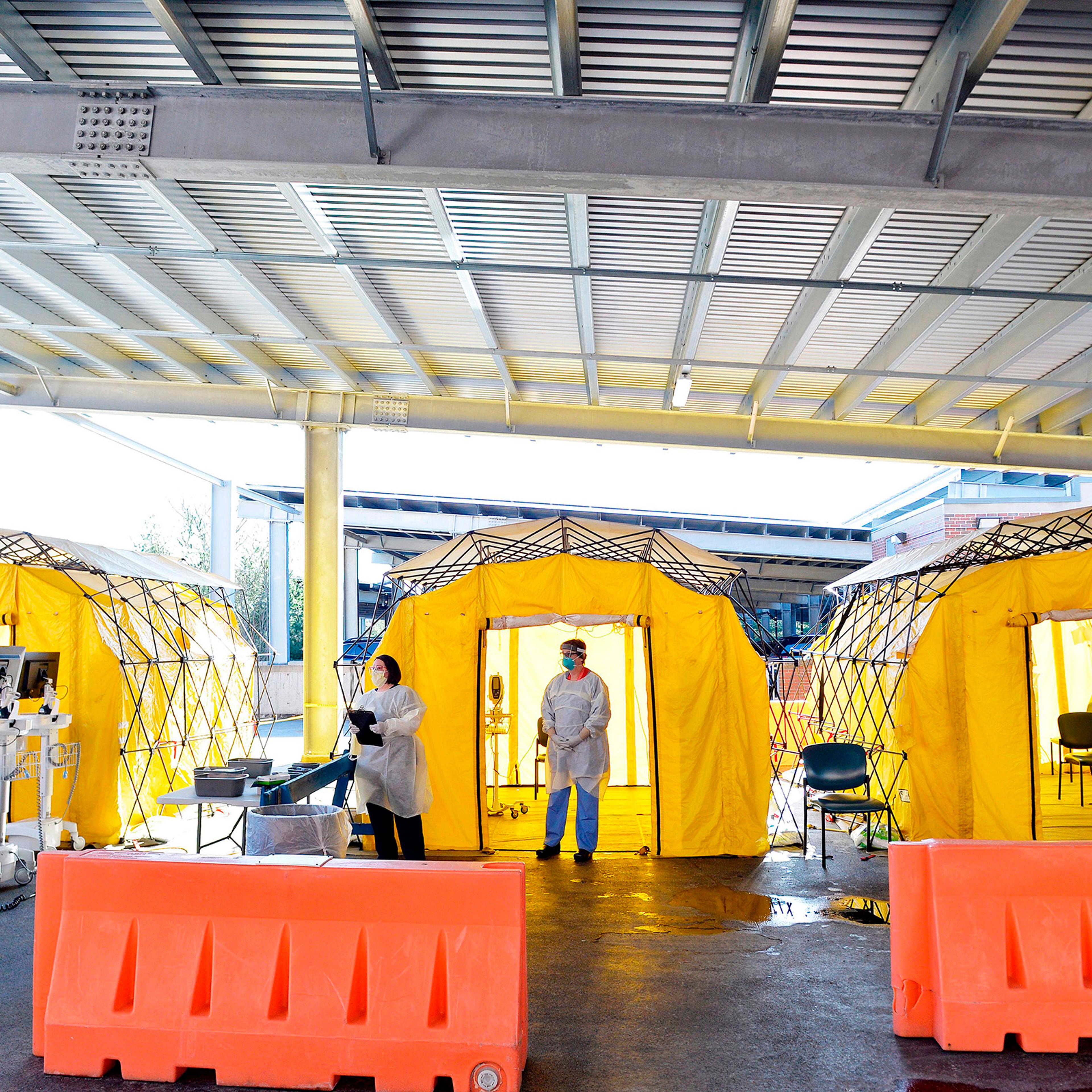 Hospital clinicians work to test patients for the coronavirus