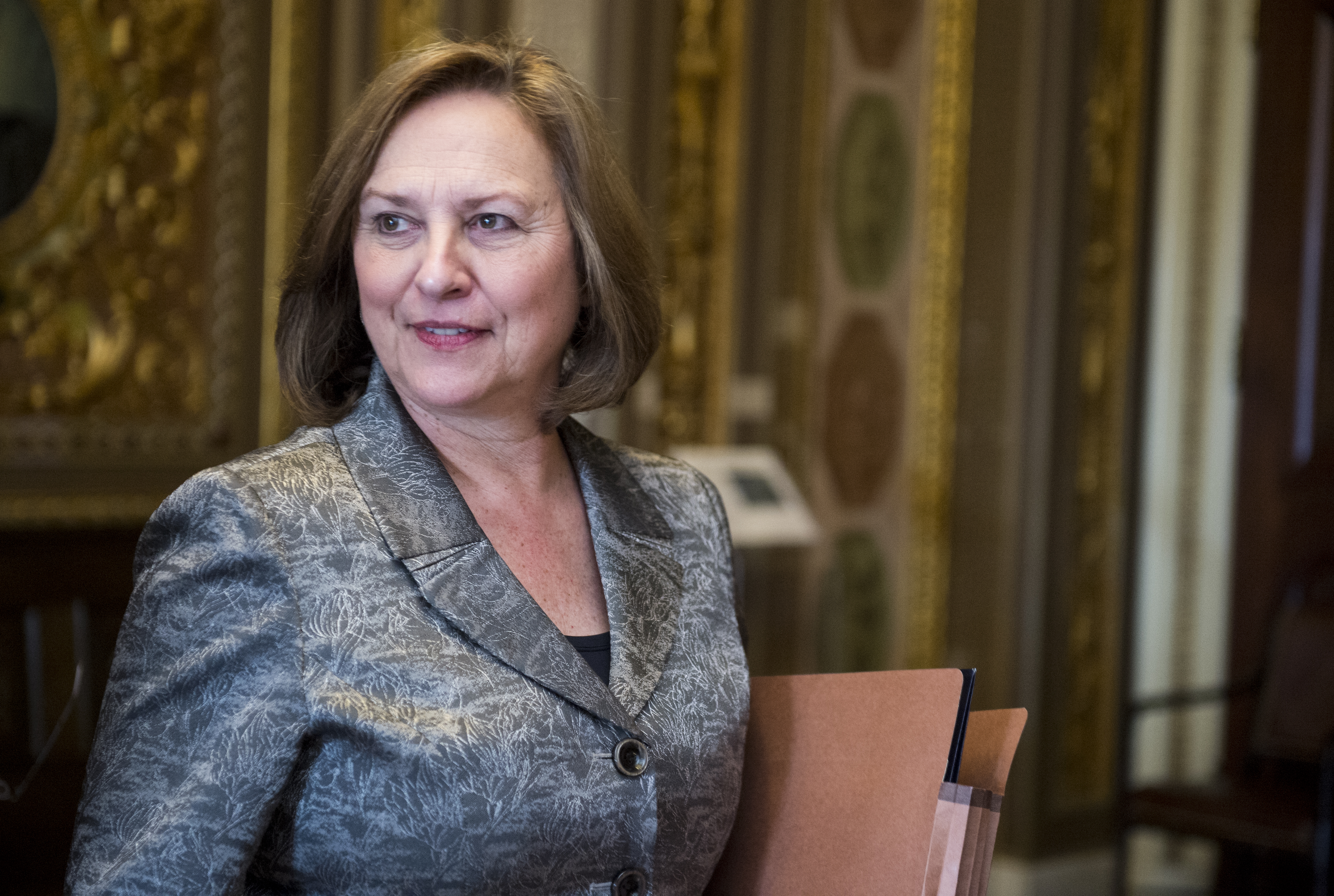 Sen. Deb Fischer, R-Neb., leaves the Senate Republicans' policy lunch on April 1, 2014.
