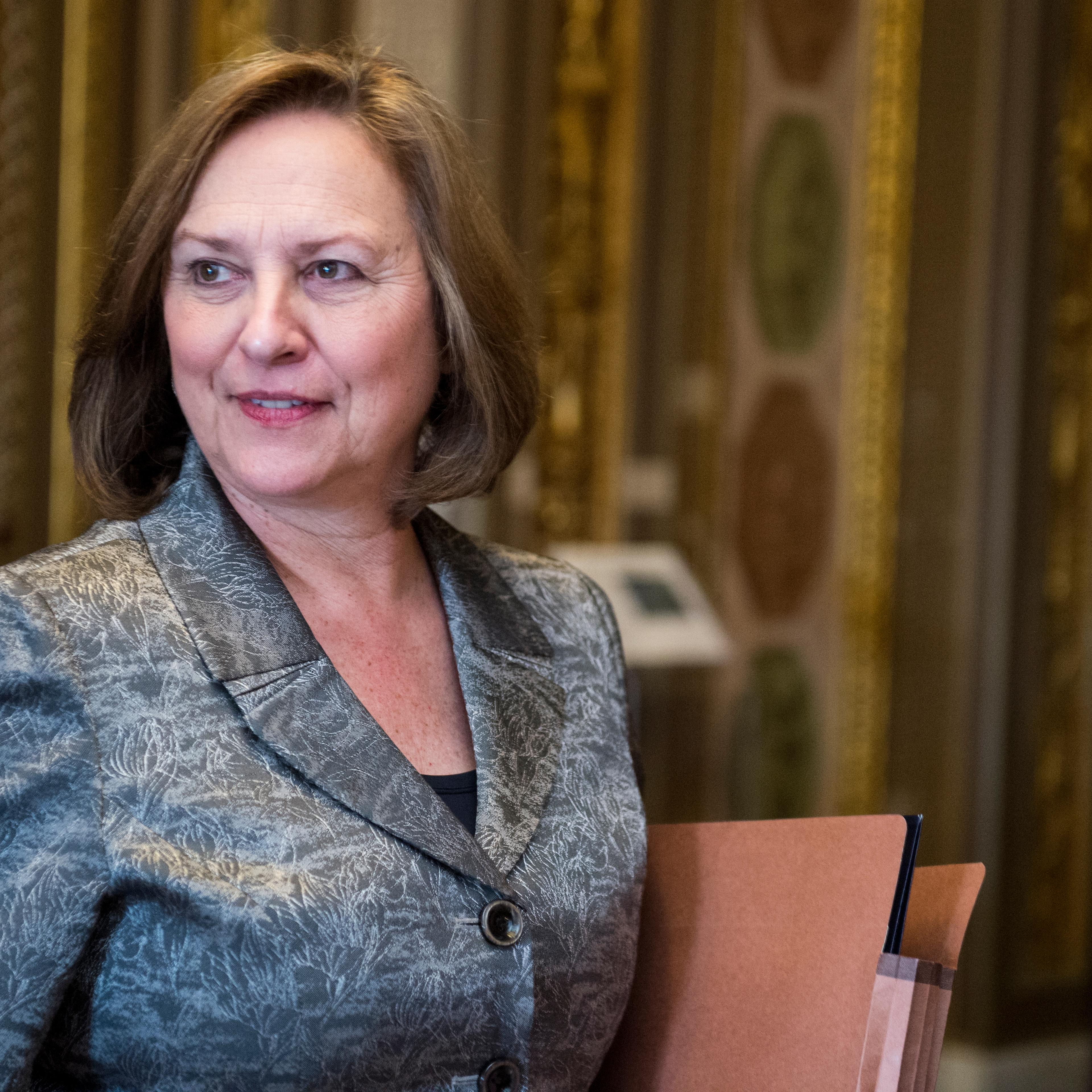 Sen. Deb Fischer, R-Neb., leaves the Senate Republicans' policy lunch on April 1, 2014.