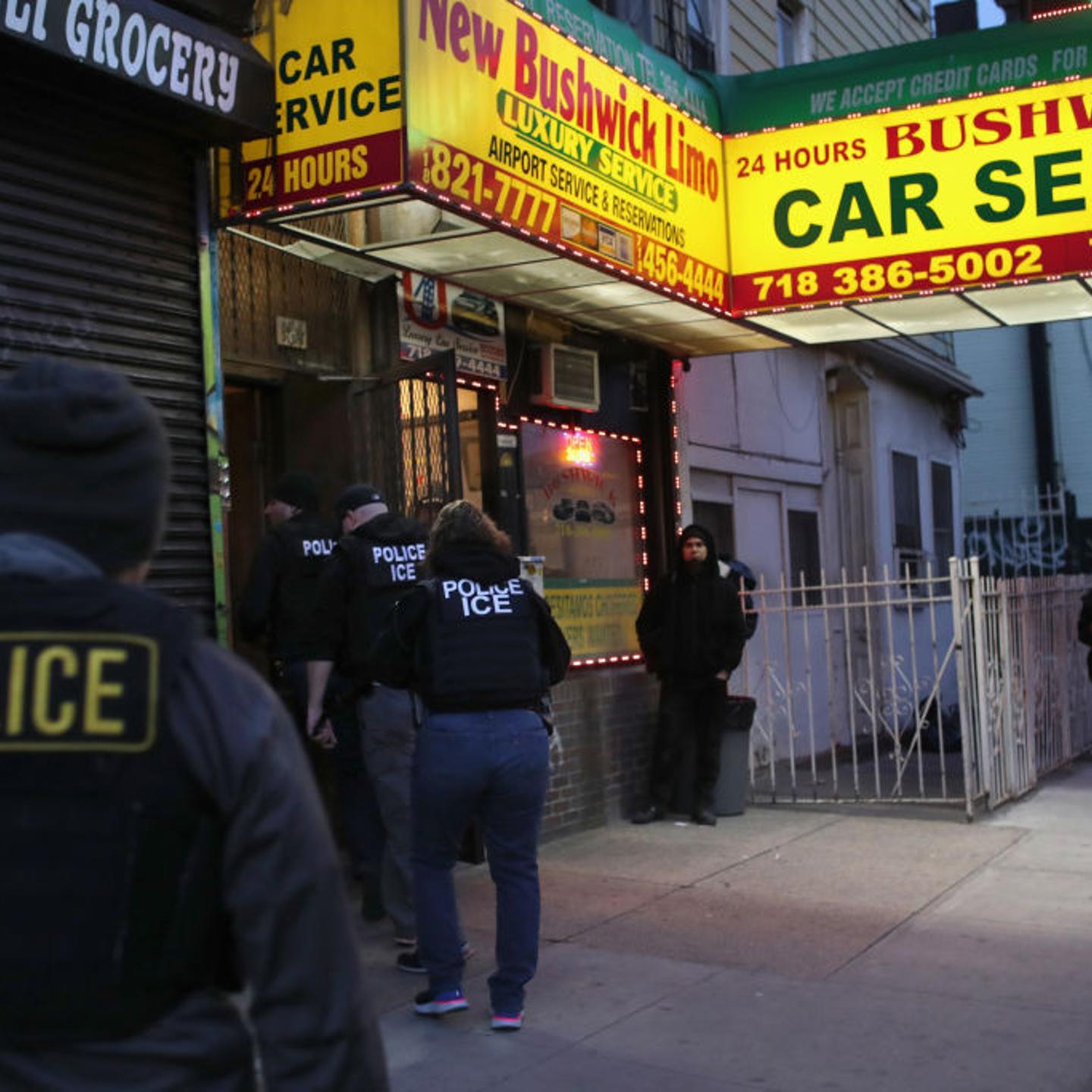 U.S. Immigration and Customs Enforcement (ICE) officers stage a raid to arrest an undocumented immigrant in New York City on April 11, 2018.