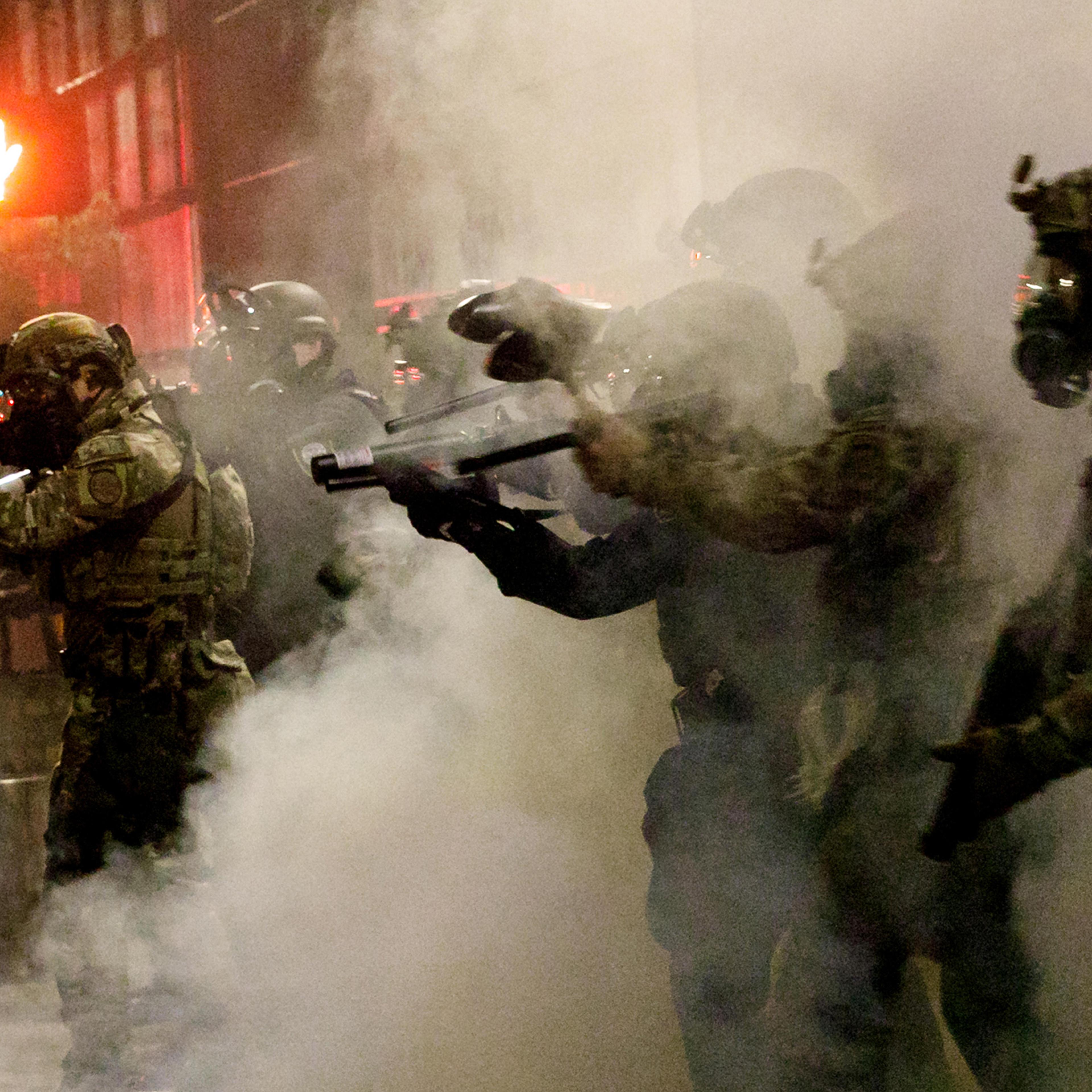 Federal officers open fire on demonstrators with 'less-lethal' weapons on July 16 at Portland Federal Courthouse