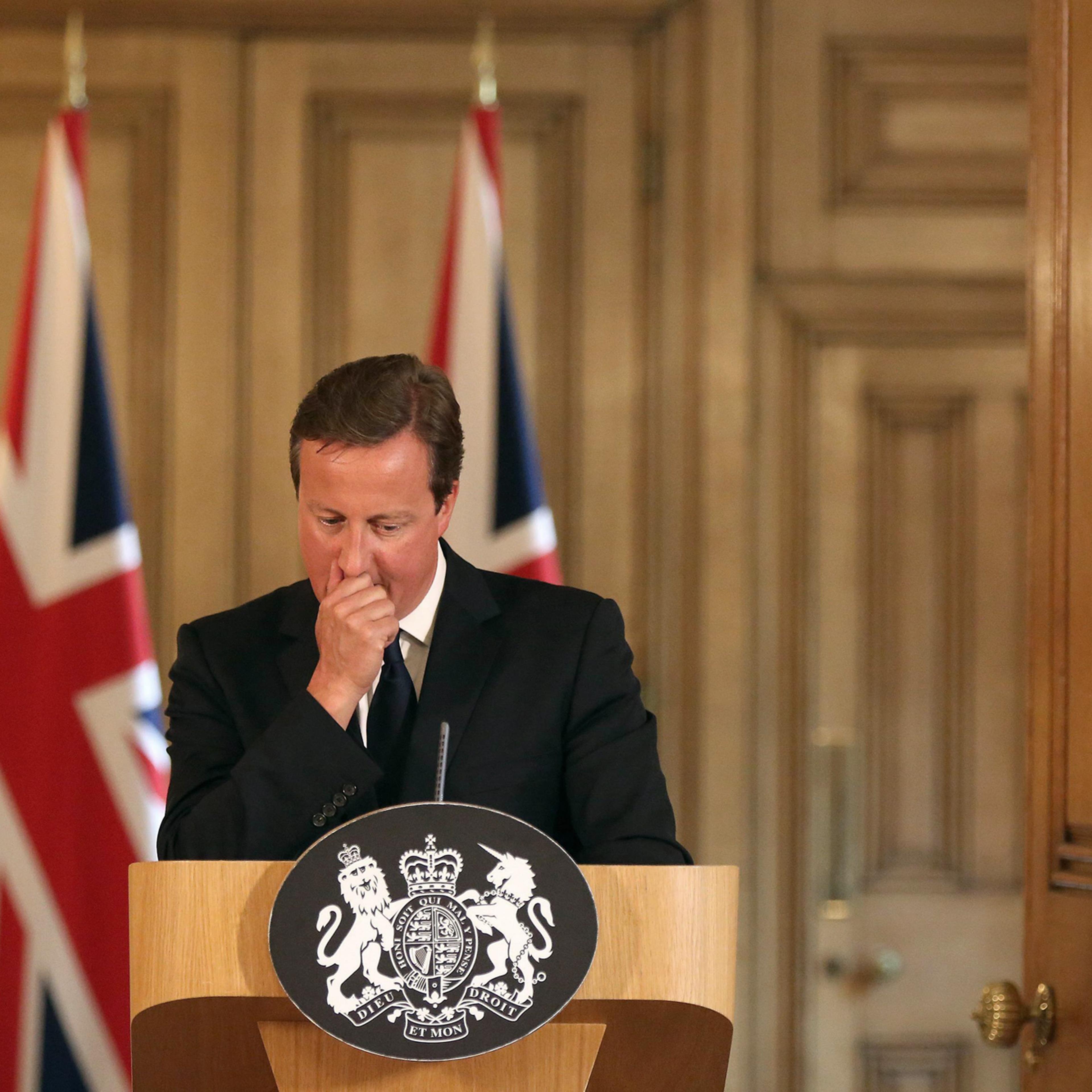 Britain's Prime Minister David Cameron pauses at a news conference in Downing Street, central London Aug. 29, 2014.