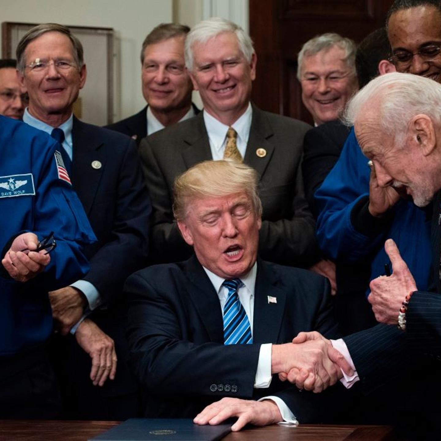 Trump shakes hands with Buzz Aldrin