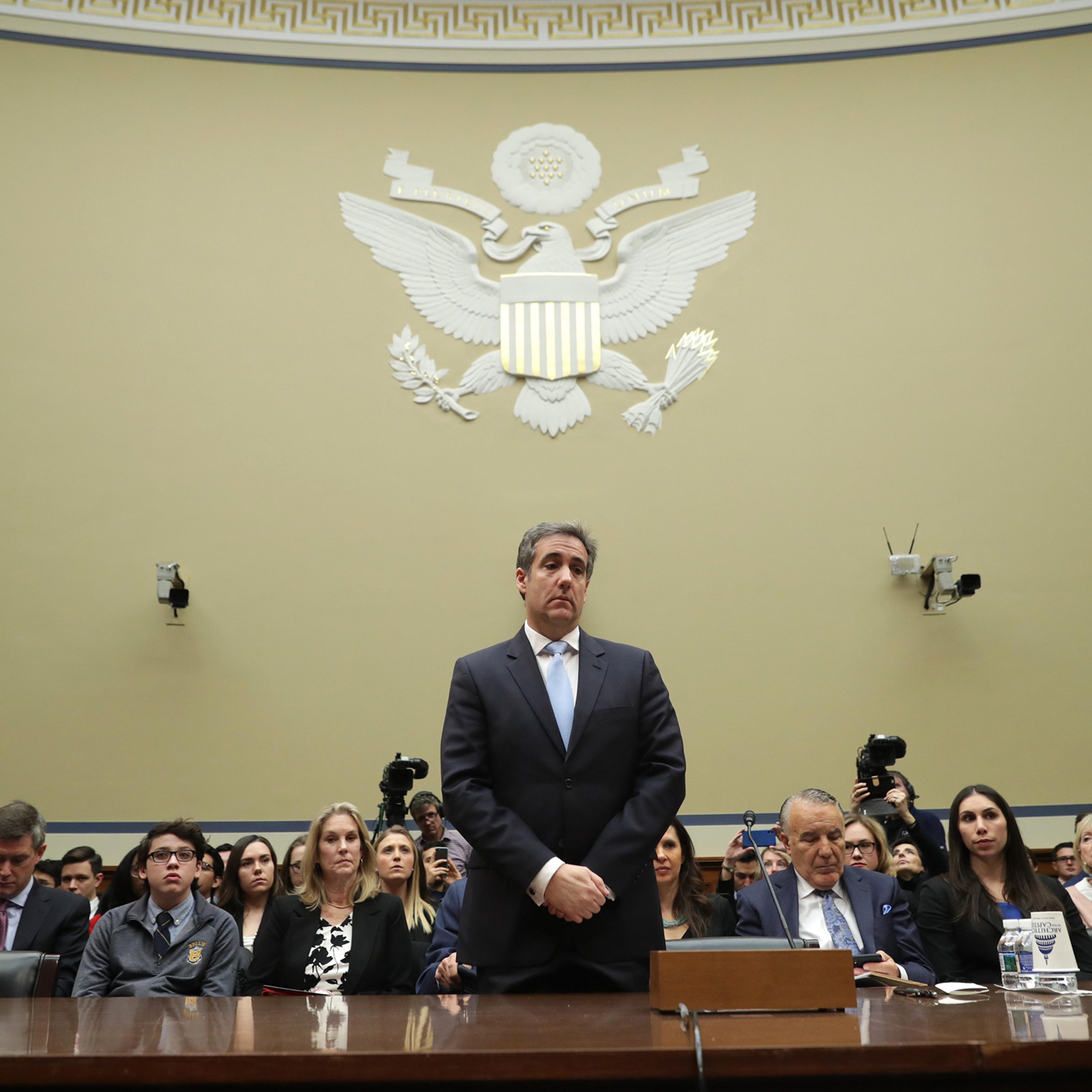 Michael Cohen prepares to testify before the House Oversight Committee on Capitol Hill Feb. 27, 2019 in Washington.