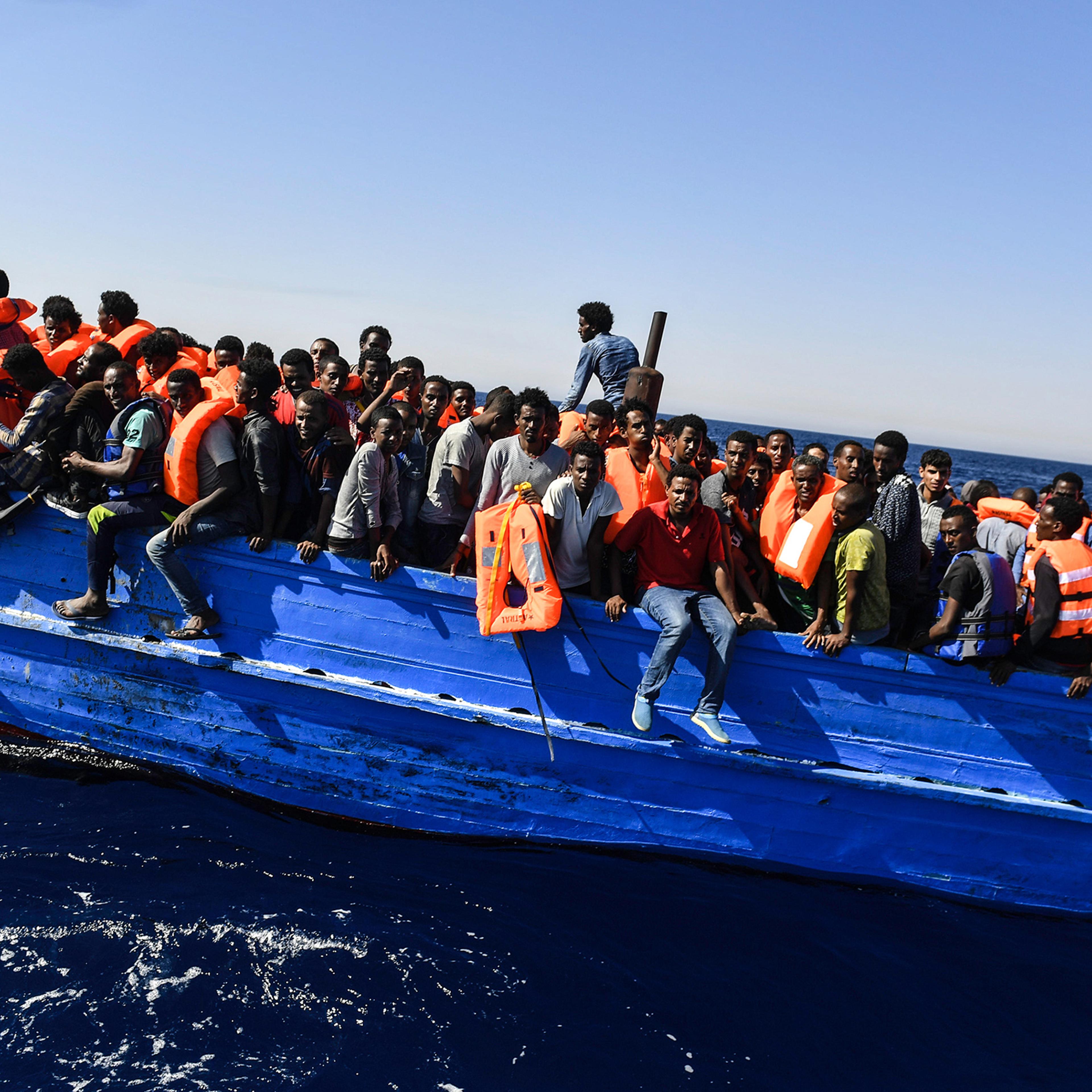 Hundreds of migrants wait to be rescued off the coast of Libya on Aug. 21, 2016.
