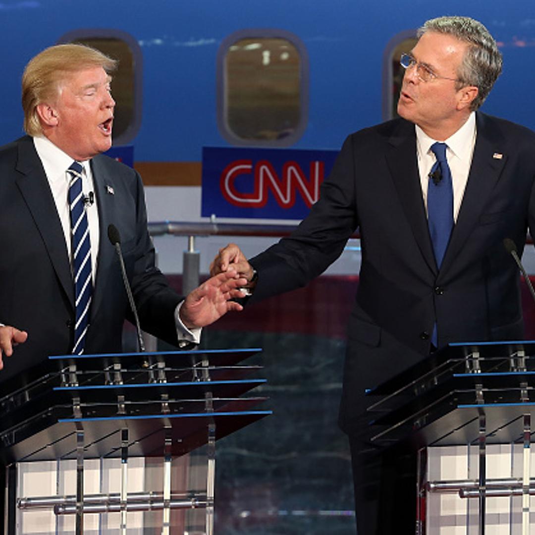 Republican presidential candidates Donald Trump (L) and Jeb Bush argue during the presidential debates at the Reagan Library on September 16, 2015 in Simi Valley, California.