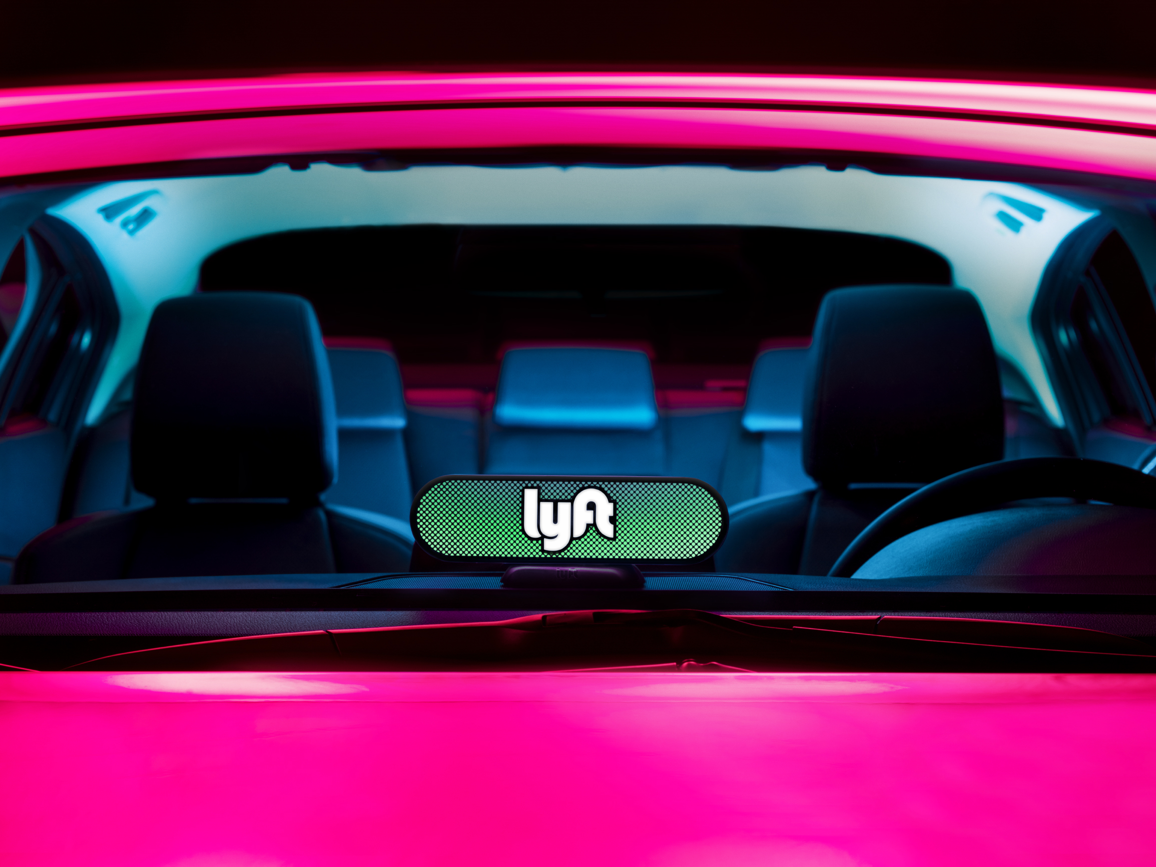 This photograph shows the view of the Amp device that passengers will have from outside the car. Personalized lighting displays will be used to help passengers and drivers connect on the street. 