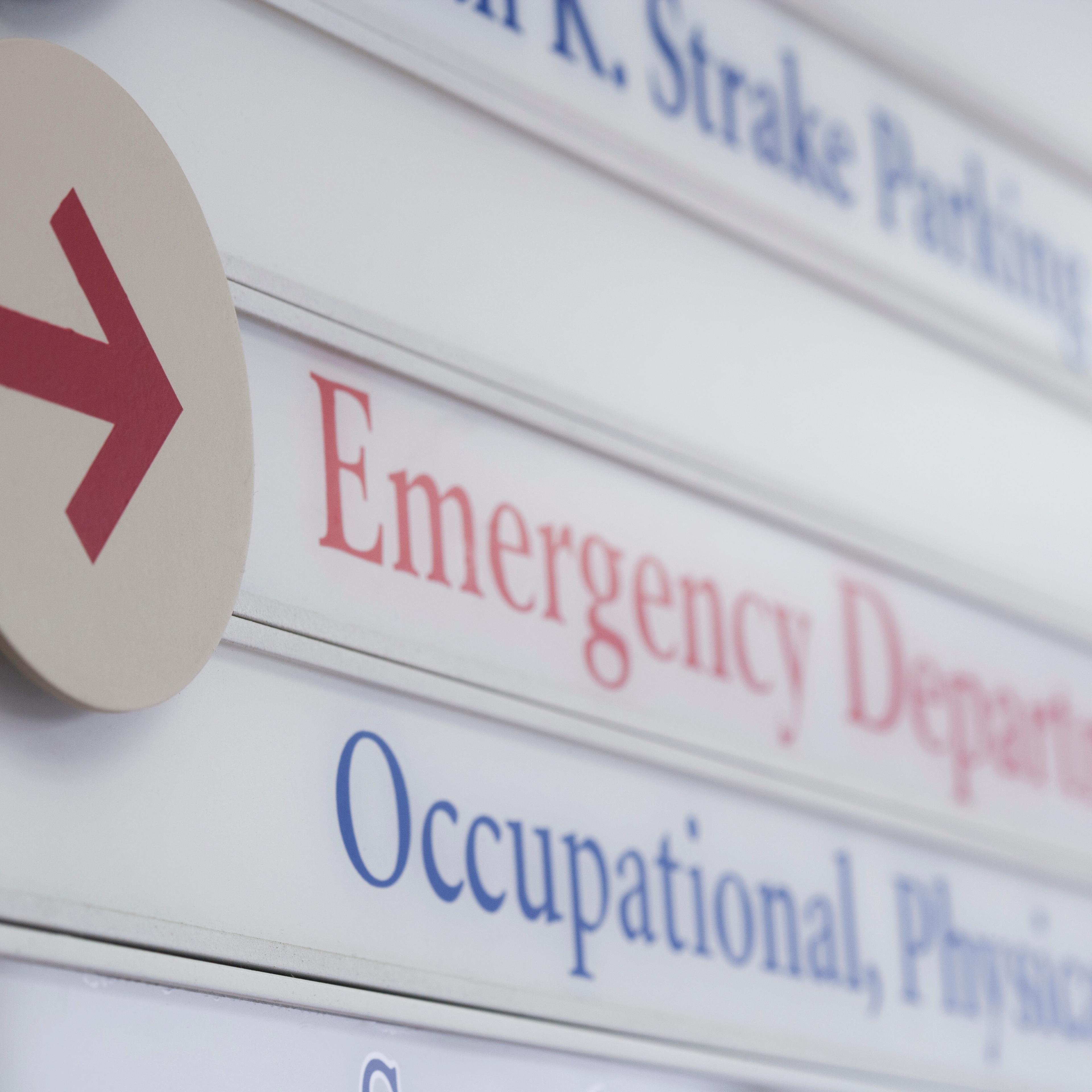 Close up of sign for emergency department in hospital