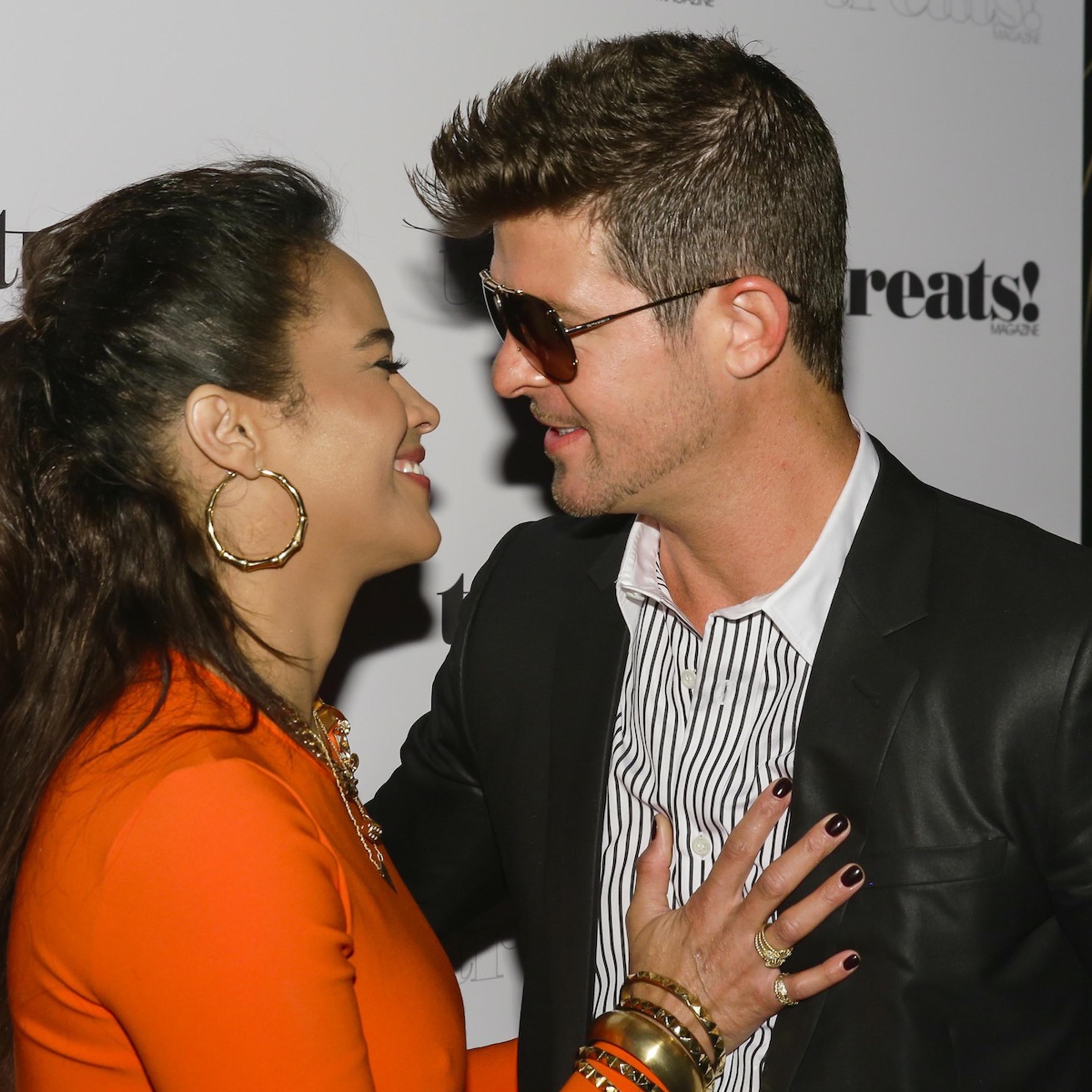 Robin Thicke and Paula Patton