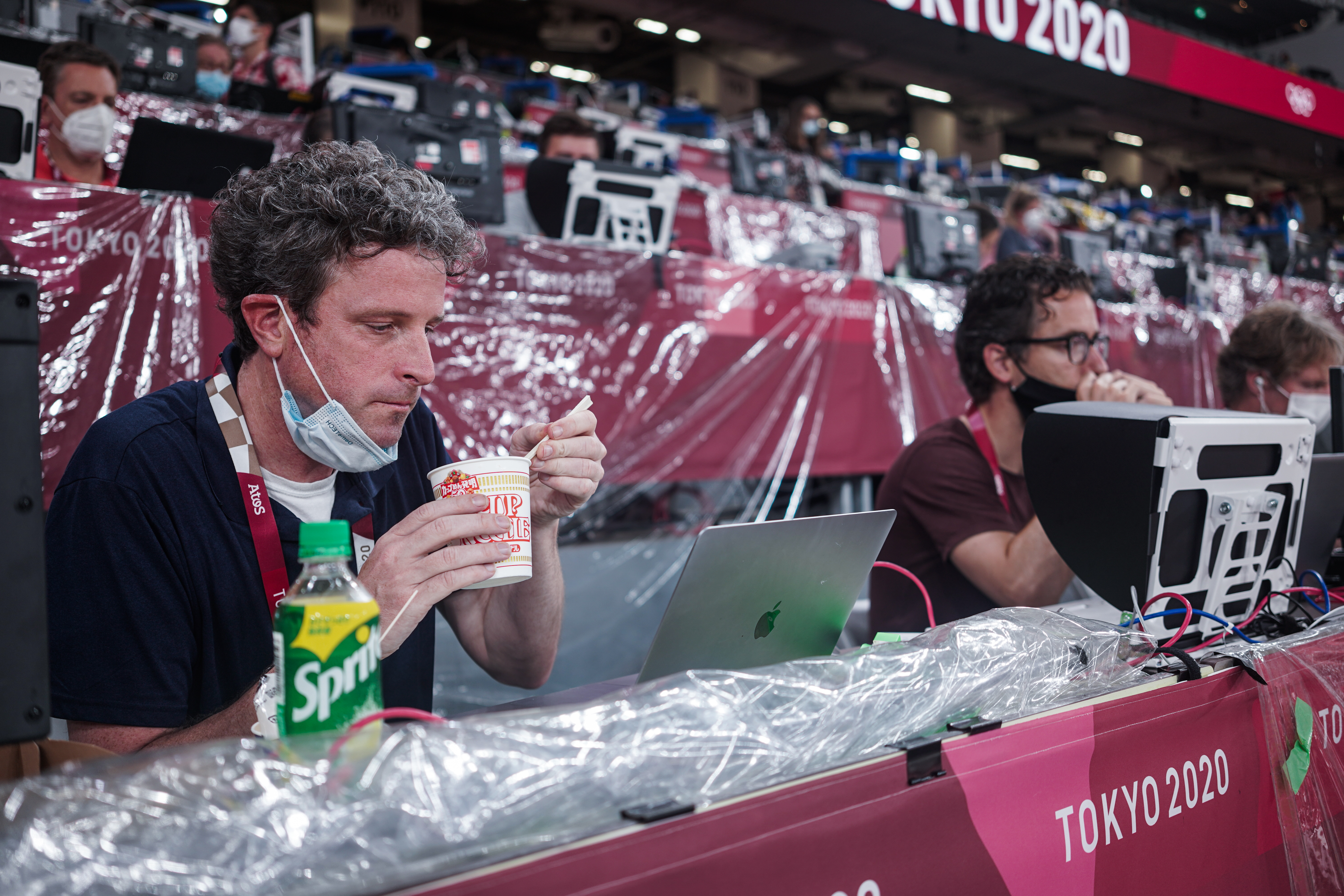 Gregory eating one of his go-to meals while covering track and field in Tokyo
