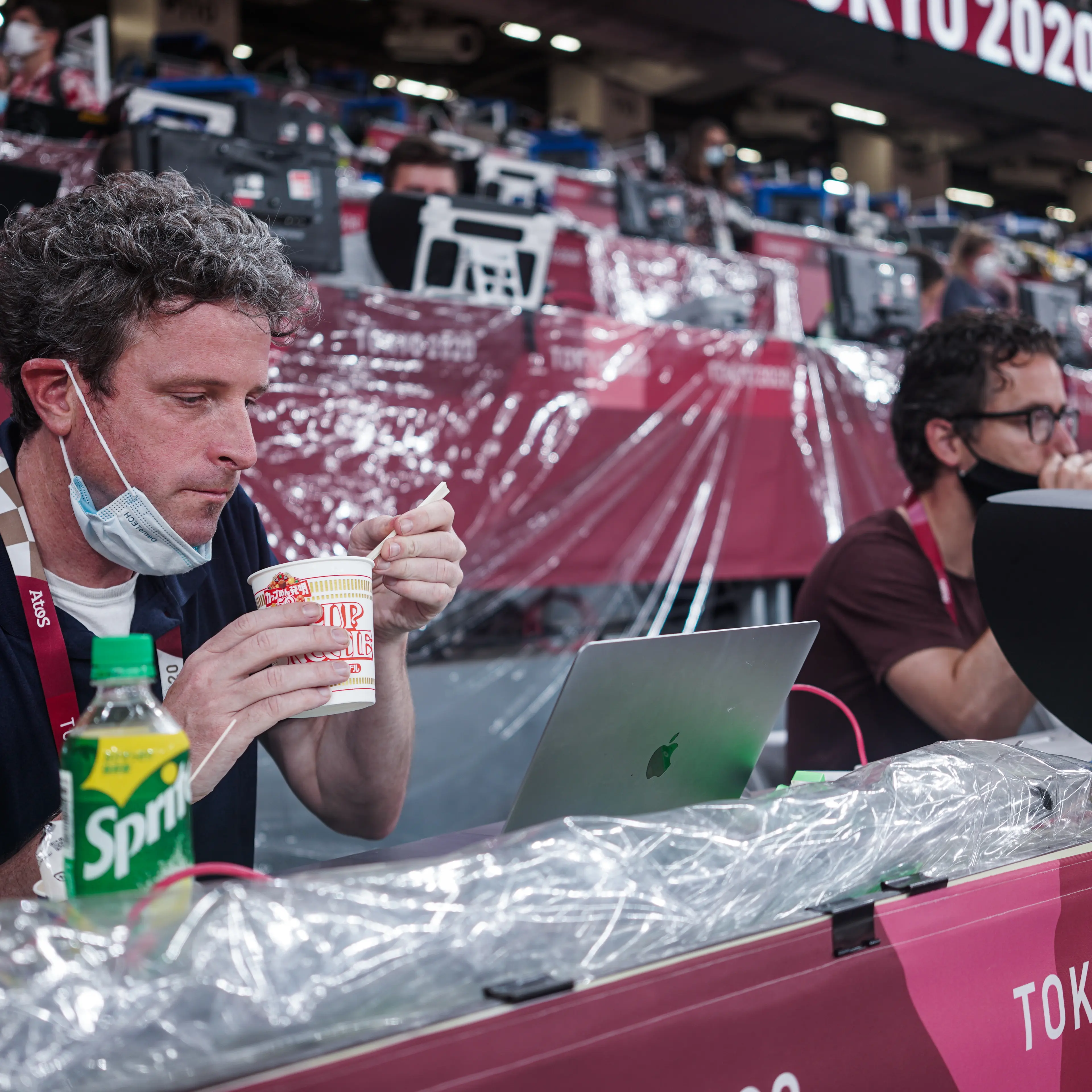 Gregory eating one of his go-to meals while covering track and field in Tokyo