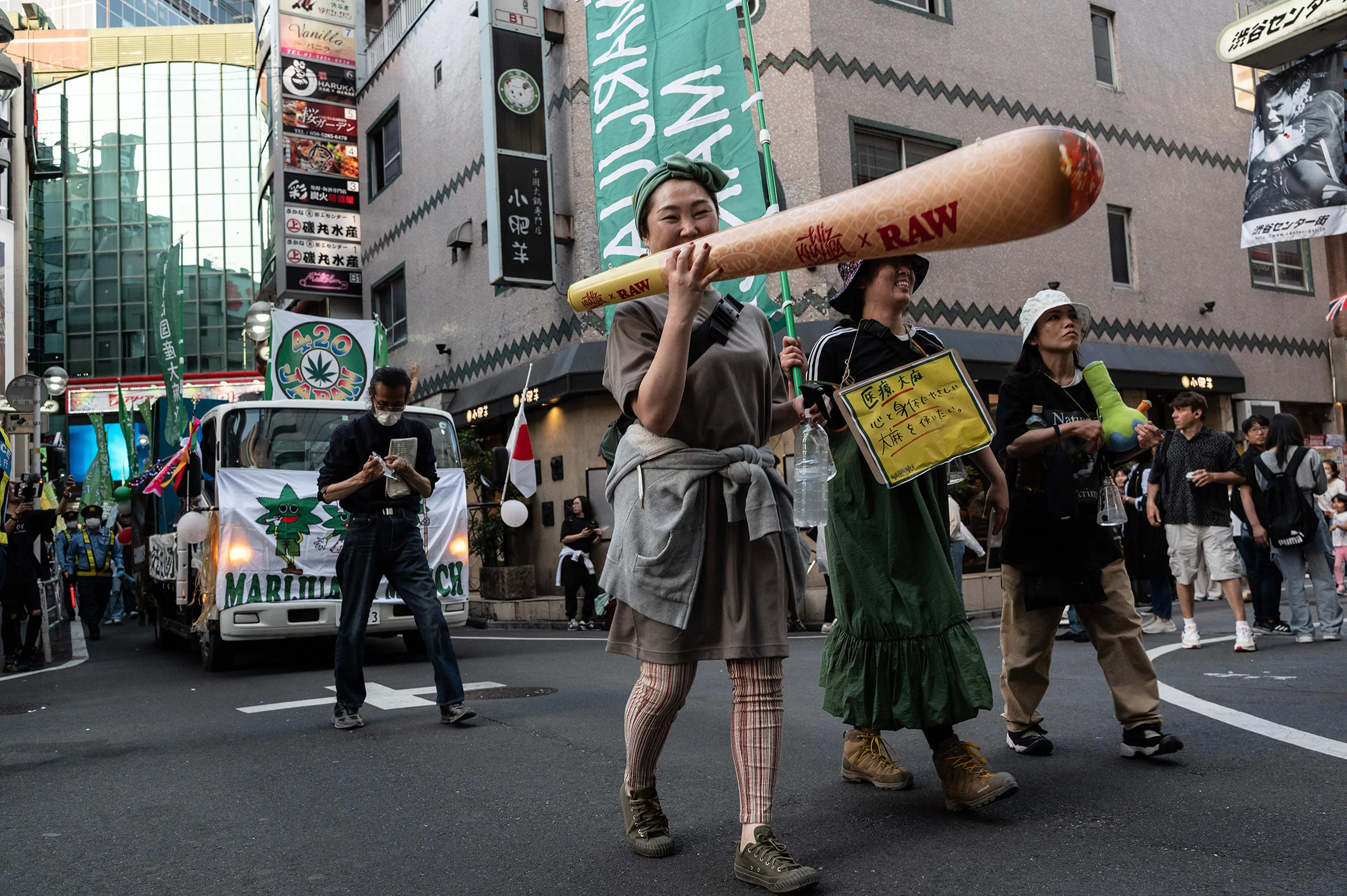 People take part in a march to call for the legalization of cannabis in the streets of Shibuya in Tokyo on May 4.