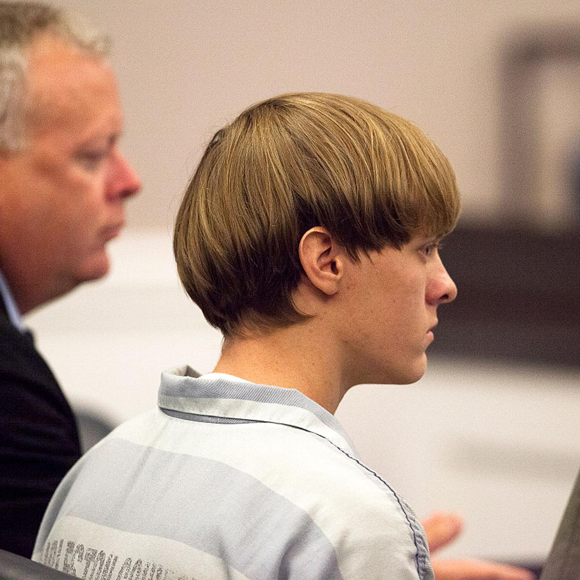 Dylann Roof, 21, listens to proceeding with assistant defense attorney William Maguire during a hearing at the Judicial Center in Charleston, S.C., on July 16, 2015.