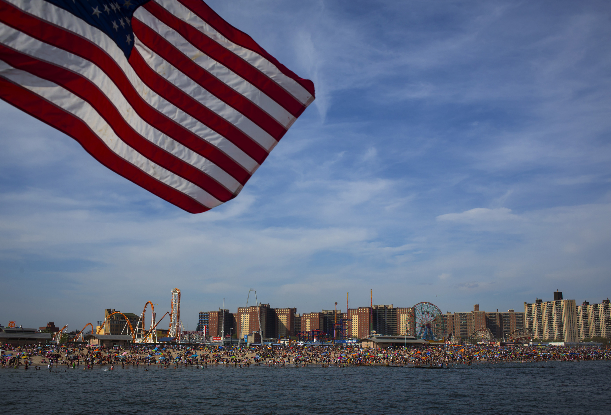 People crowd the beach at Coney Island on Memorial Day May 26, 2014 in the Brooklyn borough of New York.