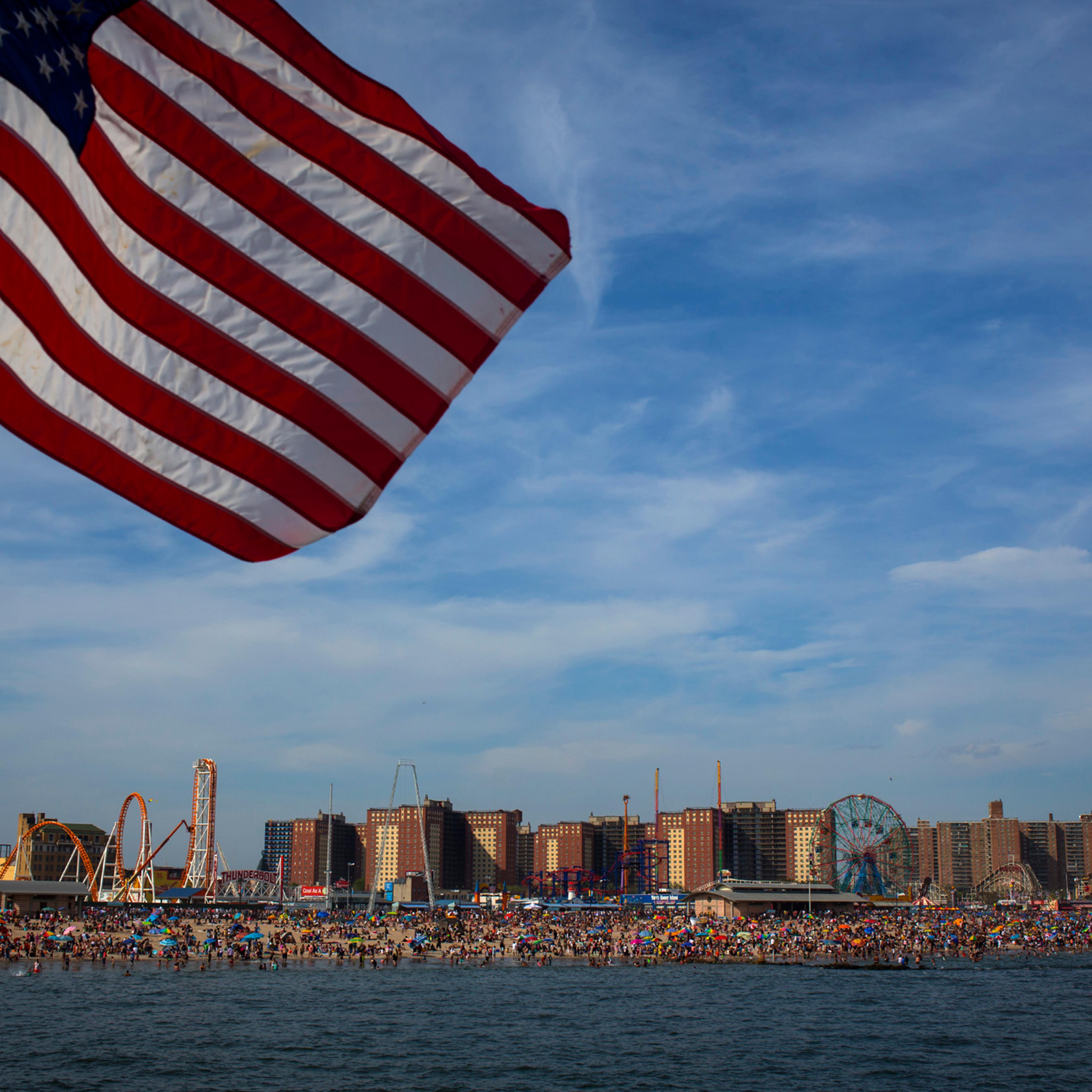 People crowd the beach at Coney Island on Memorial Day May 26, 2014 in the Brooklyn borough of New York.