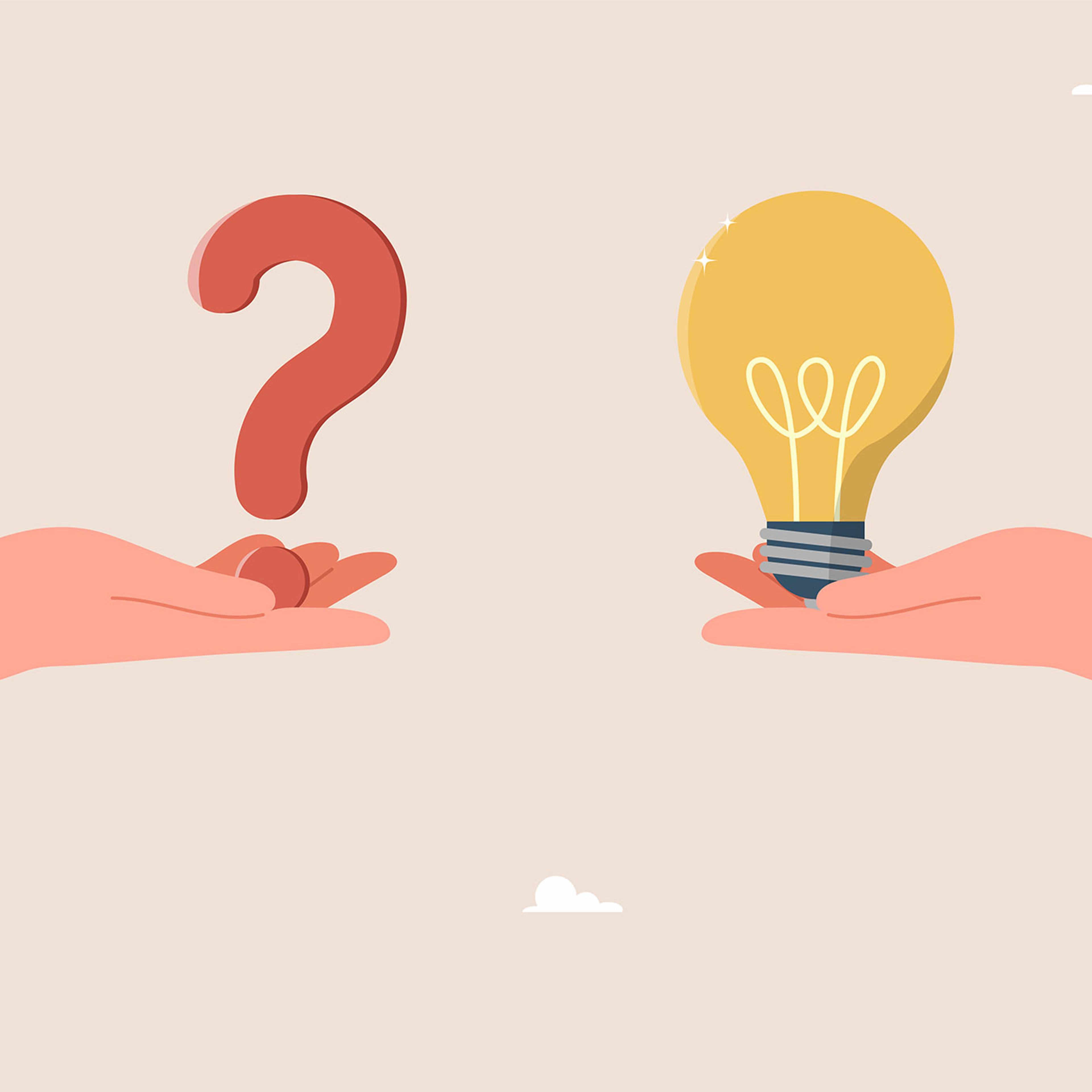 Question mark and light bulb in hands