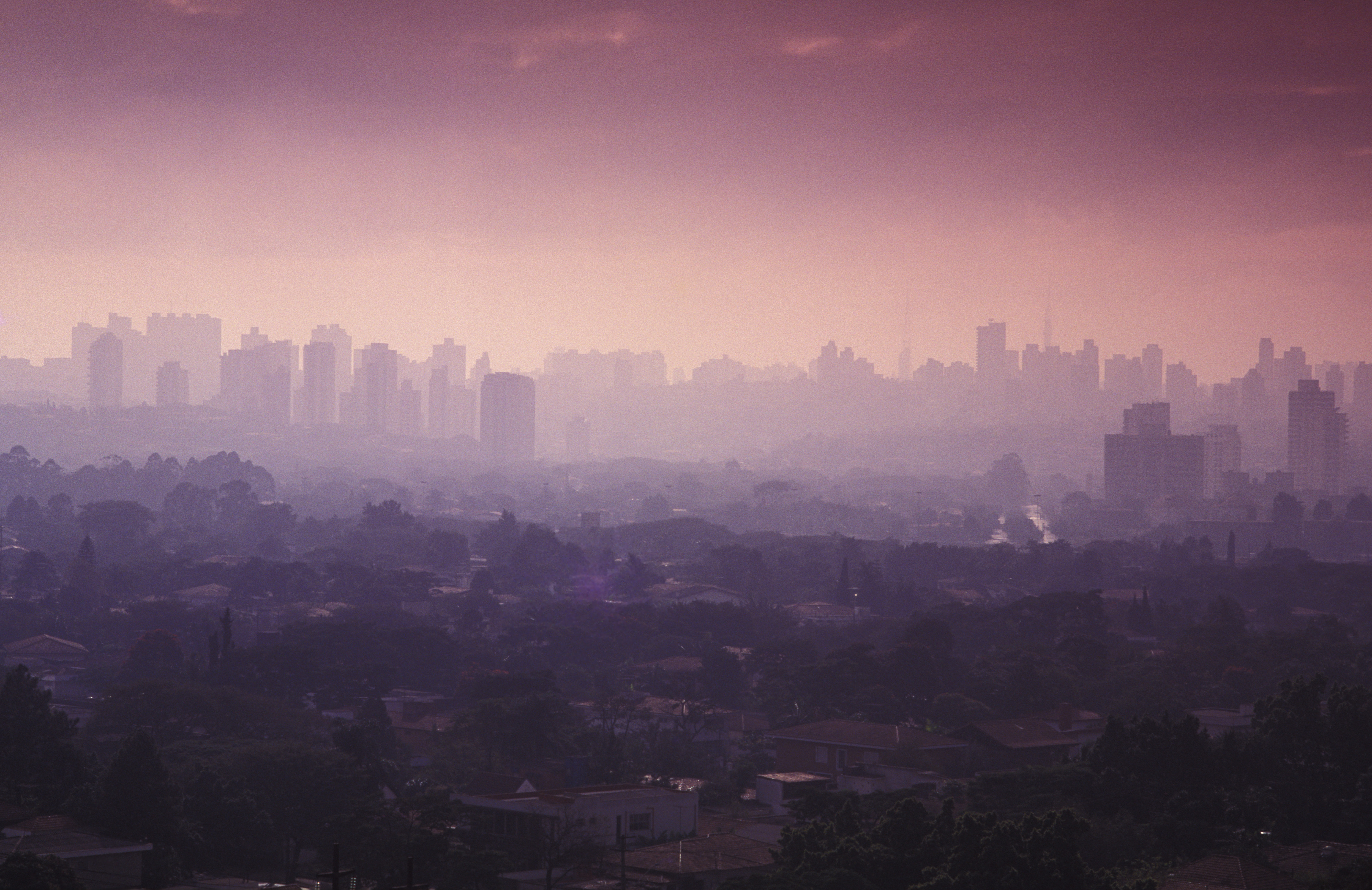 Air pollution creates a haze over Sao Paulo during sunset on Feb. 2, 2015.