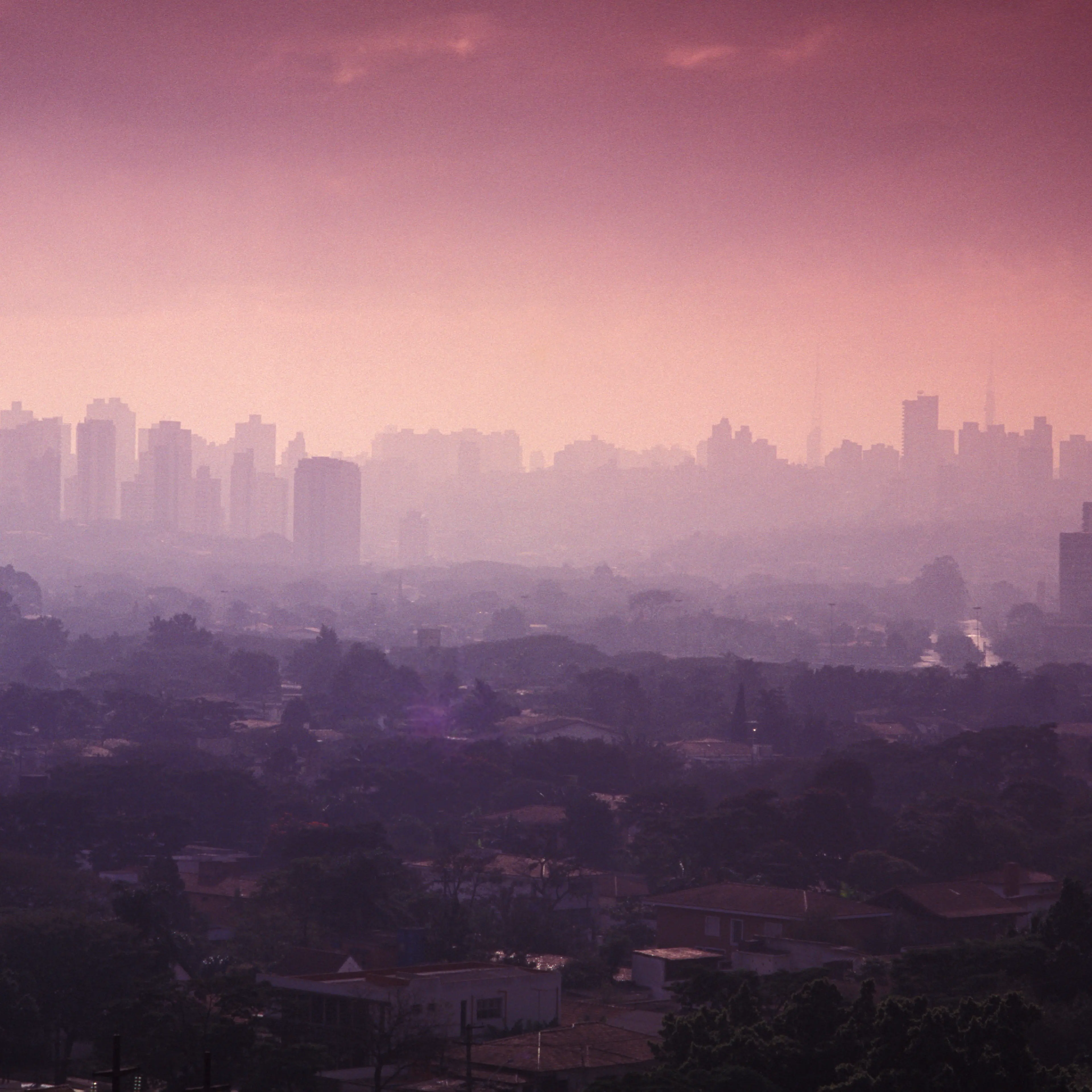 Air pollution creates a haze over Sao Paulo during sunset on Feb. 2, 2015.