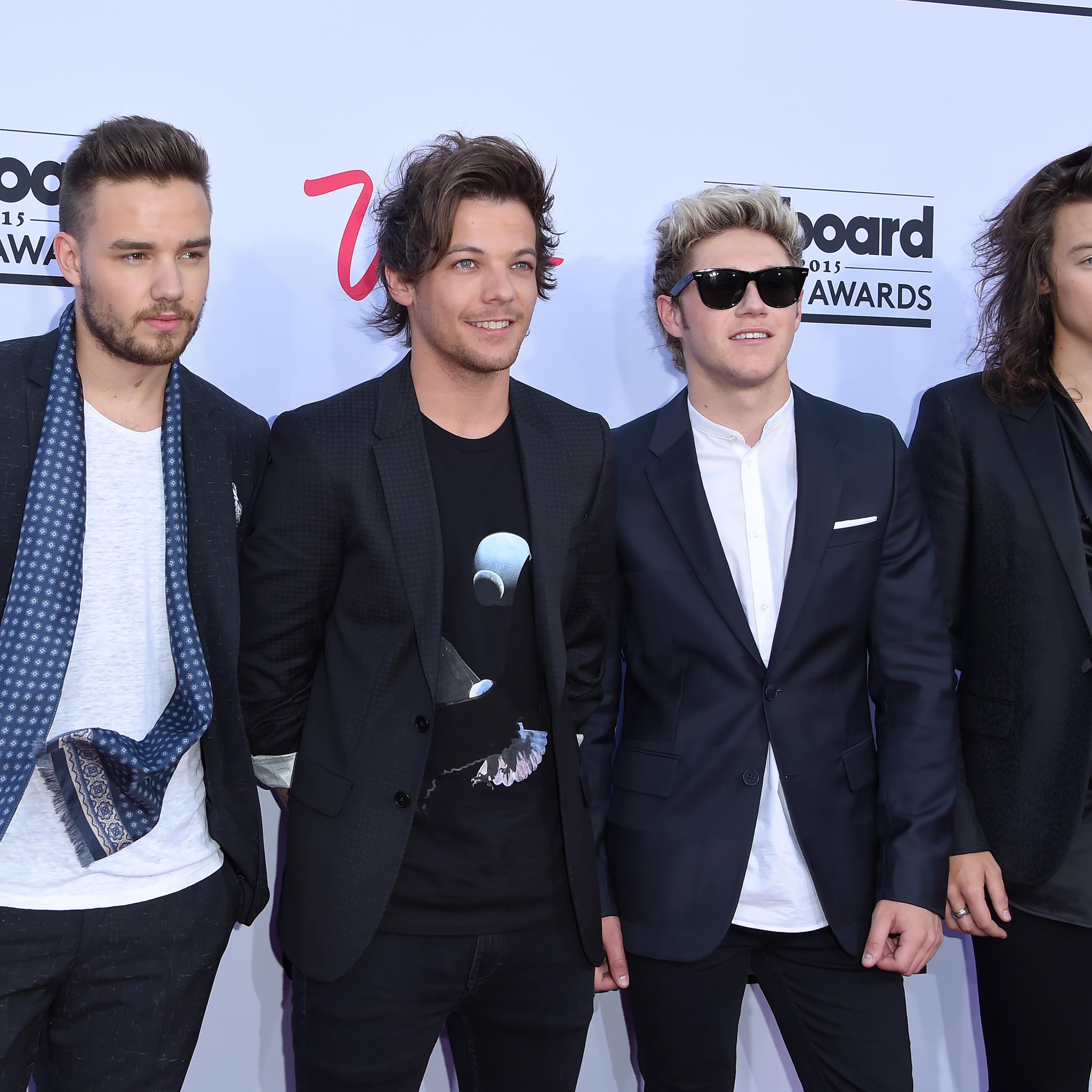 (L-R) Singers Liam Payne, Louis Tomlinson, Niall Horan and Harry Styles of One Direction at the 2015 Billboard Music Awards in Las Vegas on May 17, 2015.