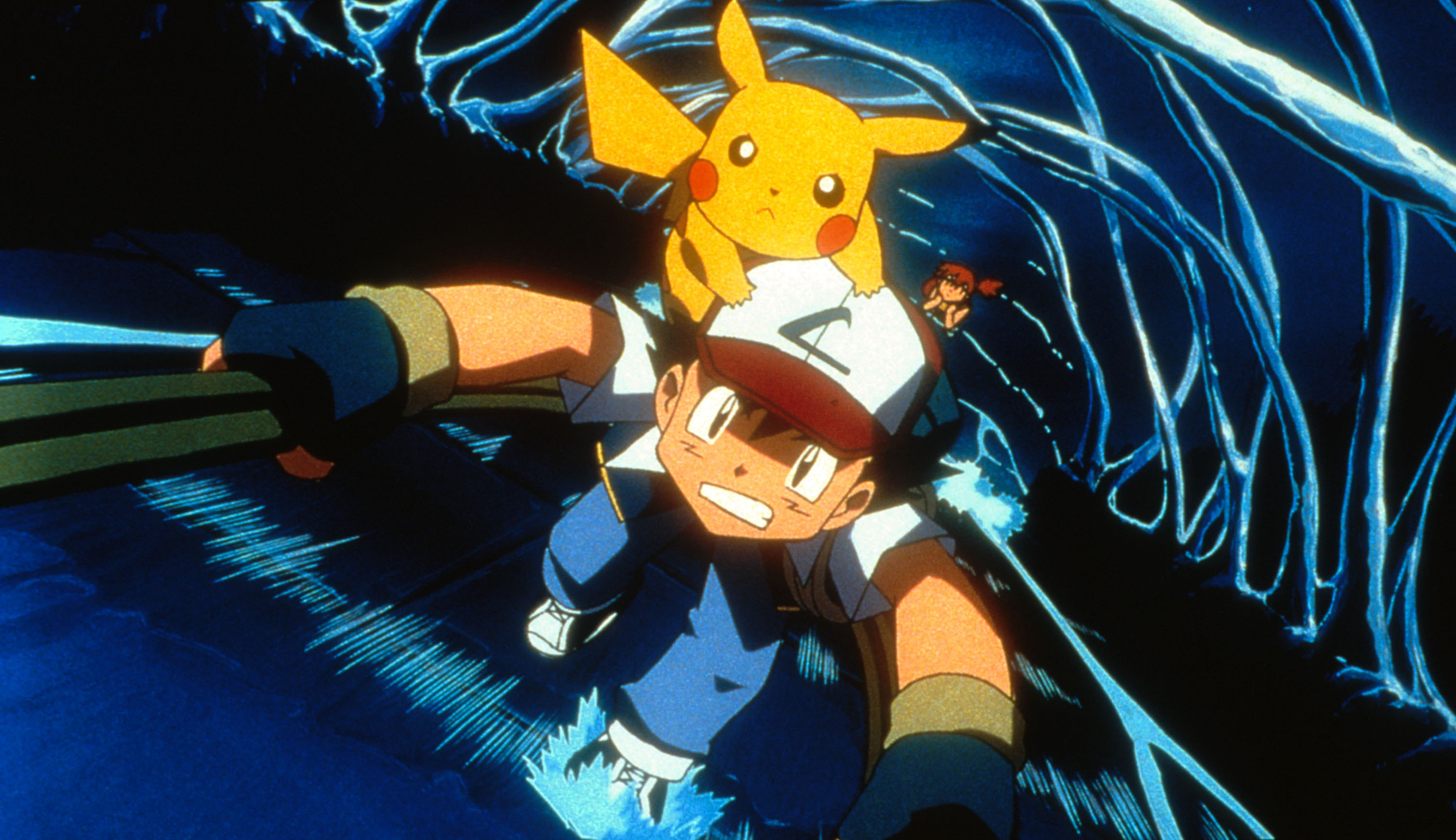 Ash, Pikachu and Misty (background) in 4Kids Entertainment's animated adventure "Pokemon3," distributed by Warner Bros. Pictures.