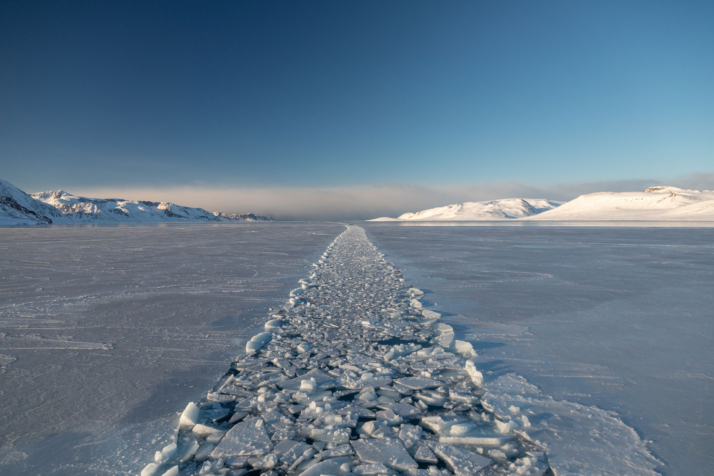 A decade ago, the west coast of Norway’s Svalbard archipelago was impassable by ships until May. Now they can navigate it as early as March, when this 2018 photo was taken.