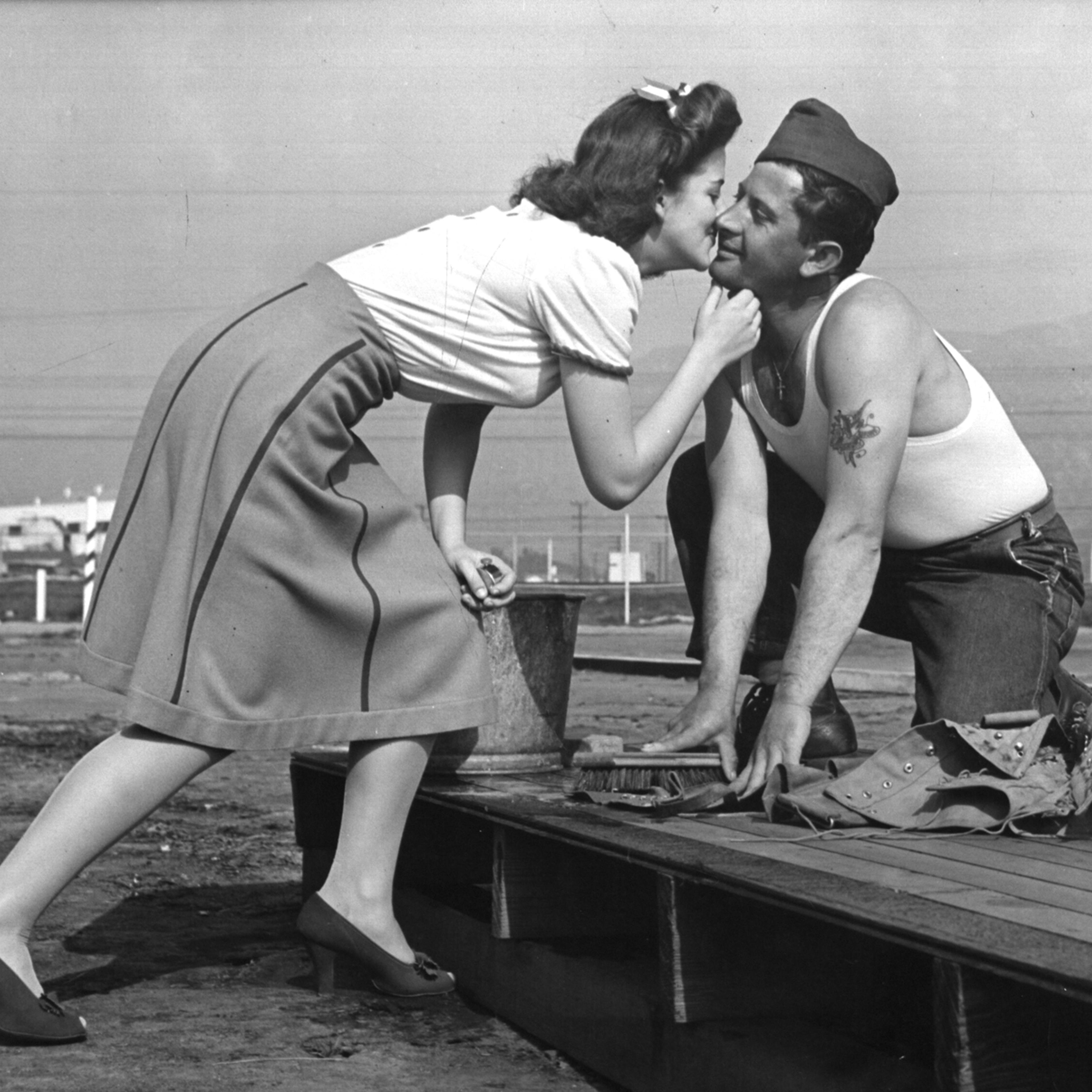 <strong>Caption from LIFE.</strong> "A tent-floor scrubber sticks his neck out and recieves a right and a lip to the jaw. 'Now I won't mind if I kick the bucket,' cried he as he rose and upset his scrub pail."