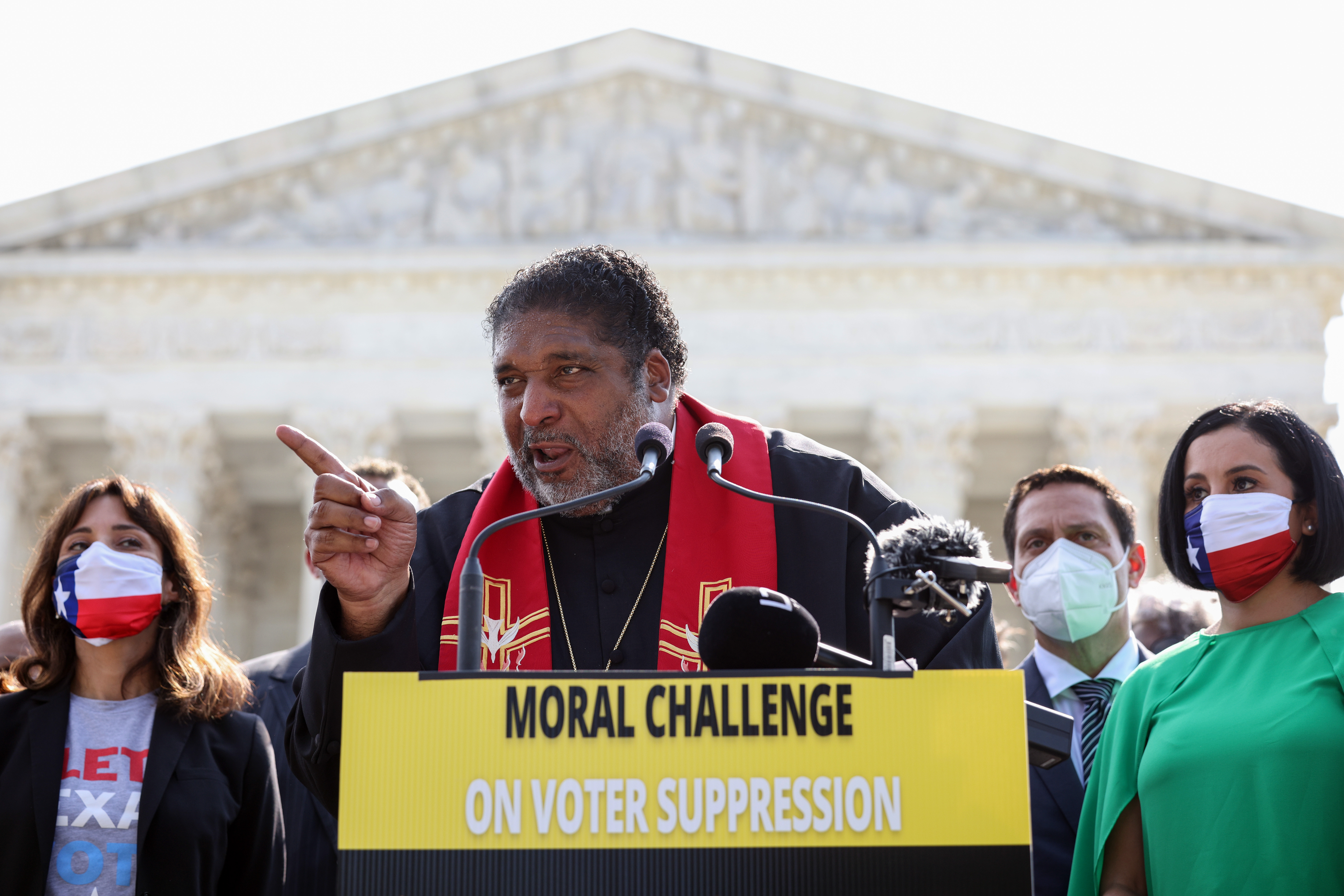 Rev. William Barber speaks alongside Texas State Representatives and fellow religious leaders, in Washington, D.C., on Aug. 12, 2021.