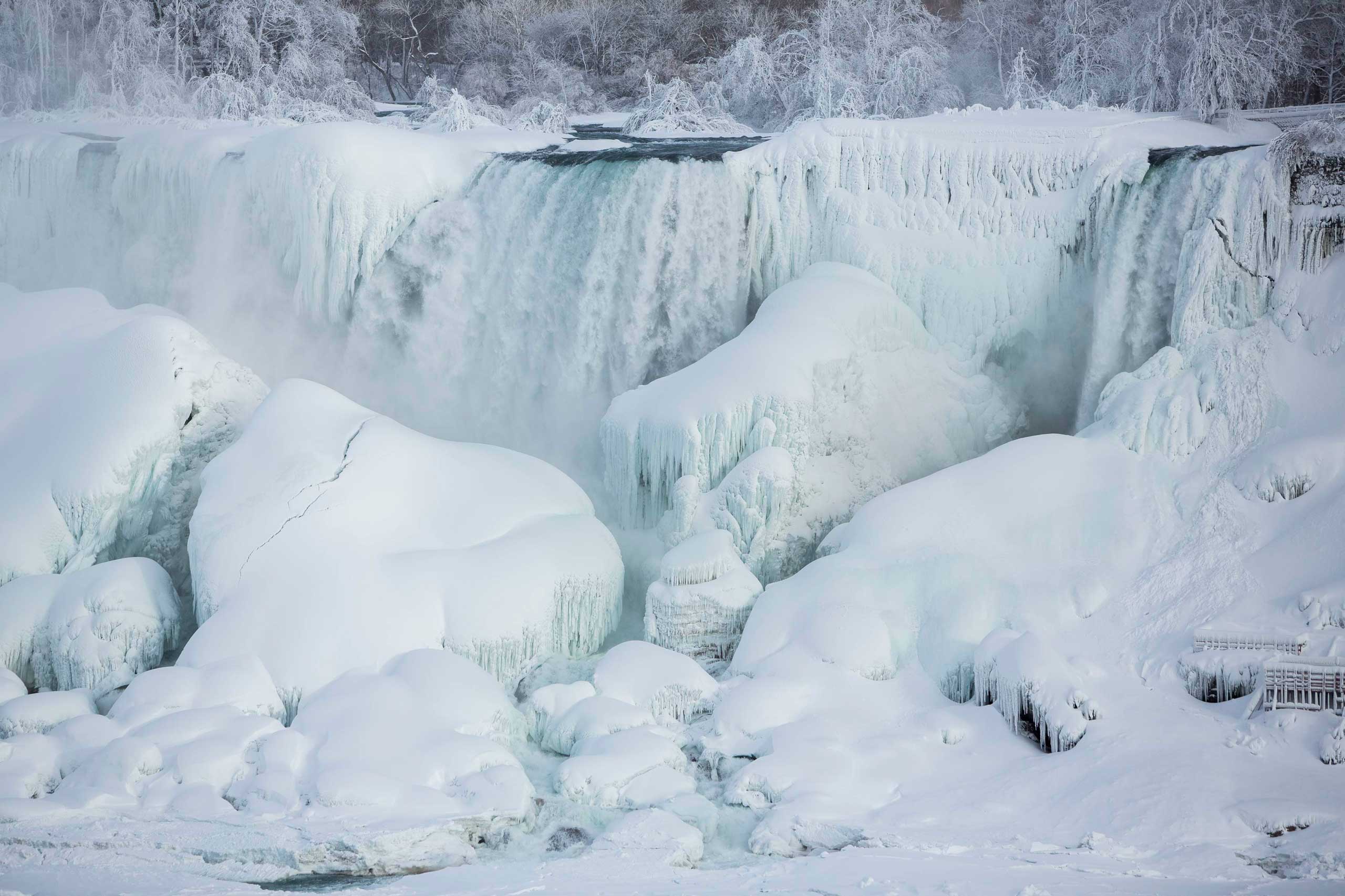 A partially frozen American Falls in sub freezing temperatures is seen in Niagara Falls, Ontario, Canada, Feb. 17, 2015.