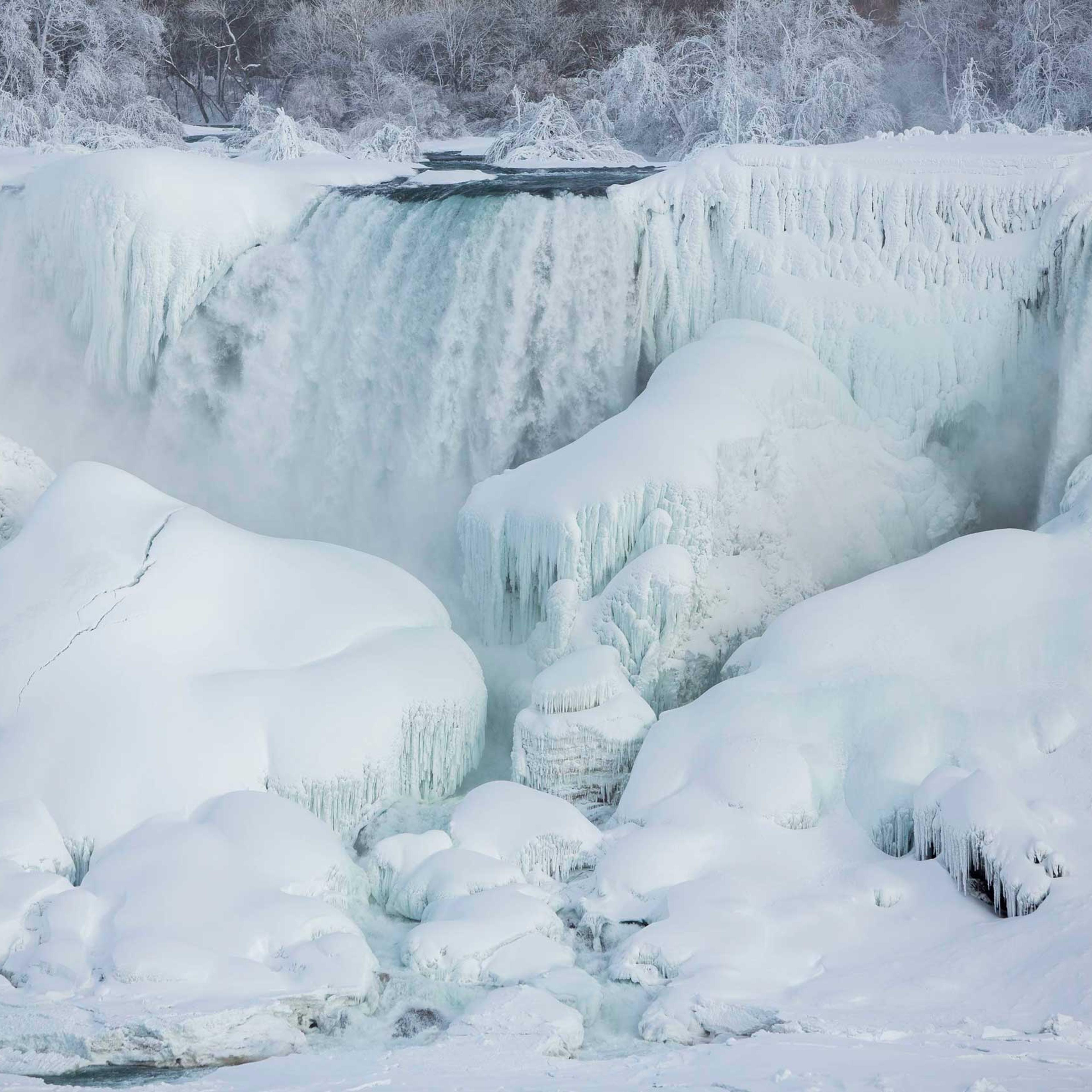 A partially frozen American Falls in sub freezing temperatures is seen in Niagara Falls, Ontario, Canada, Feb. 17, 2015.