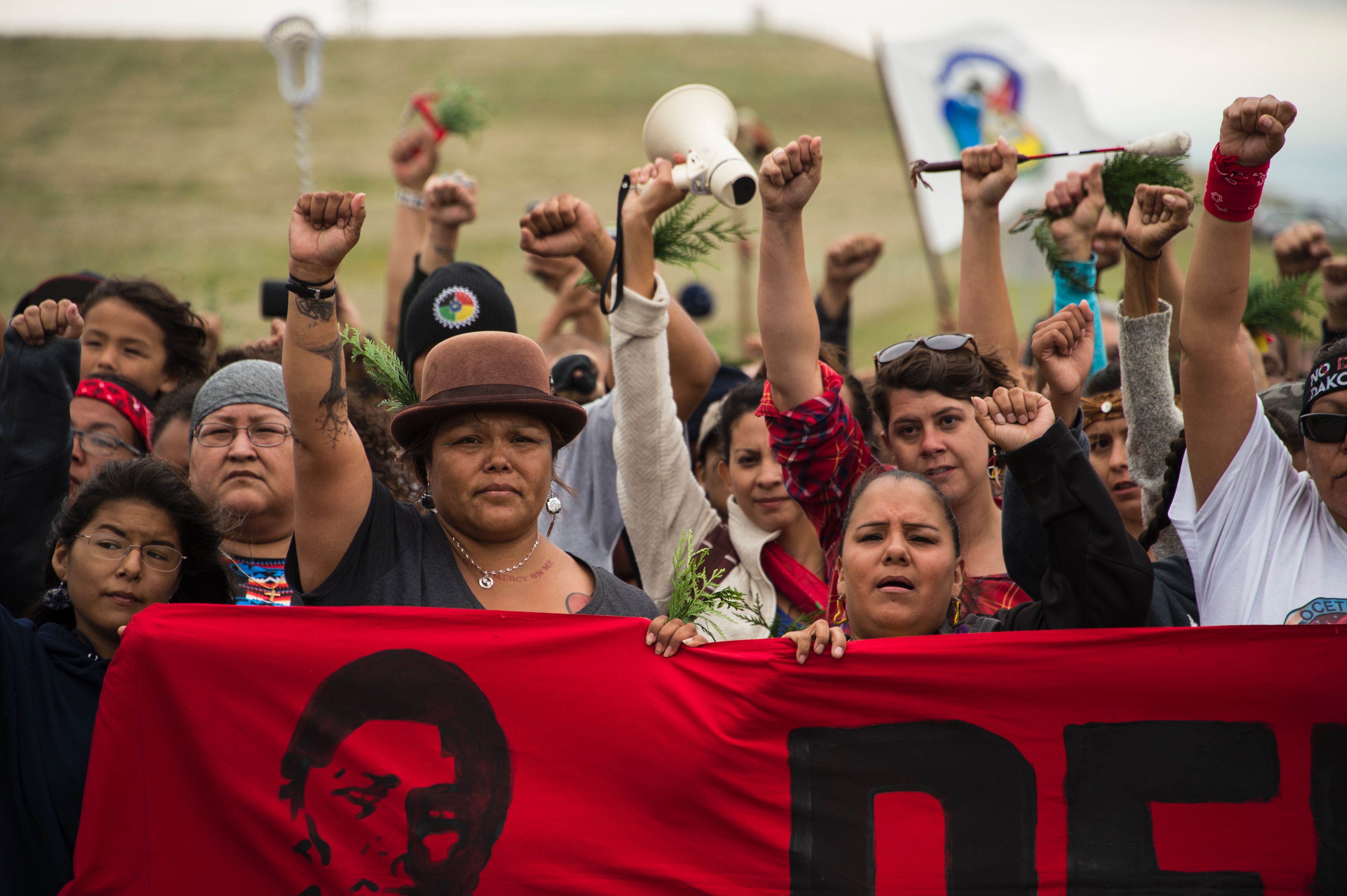 Native Americans march to a burial ground sacred site that was disturbed by bulldozers building the Dakota Access Pipeline, near the encampment where hundreds of people have gathered to join the Standing Rock Sioux Tribe's protest of the oil pipeline tha