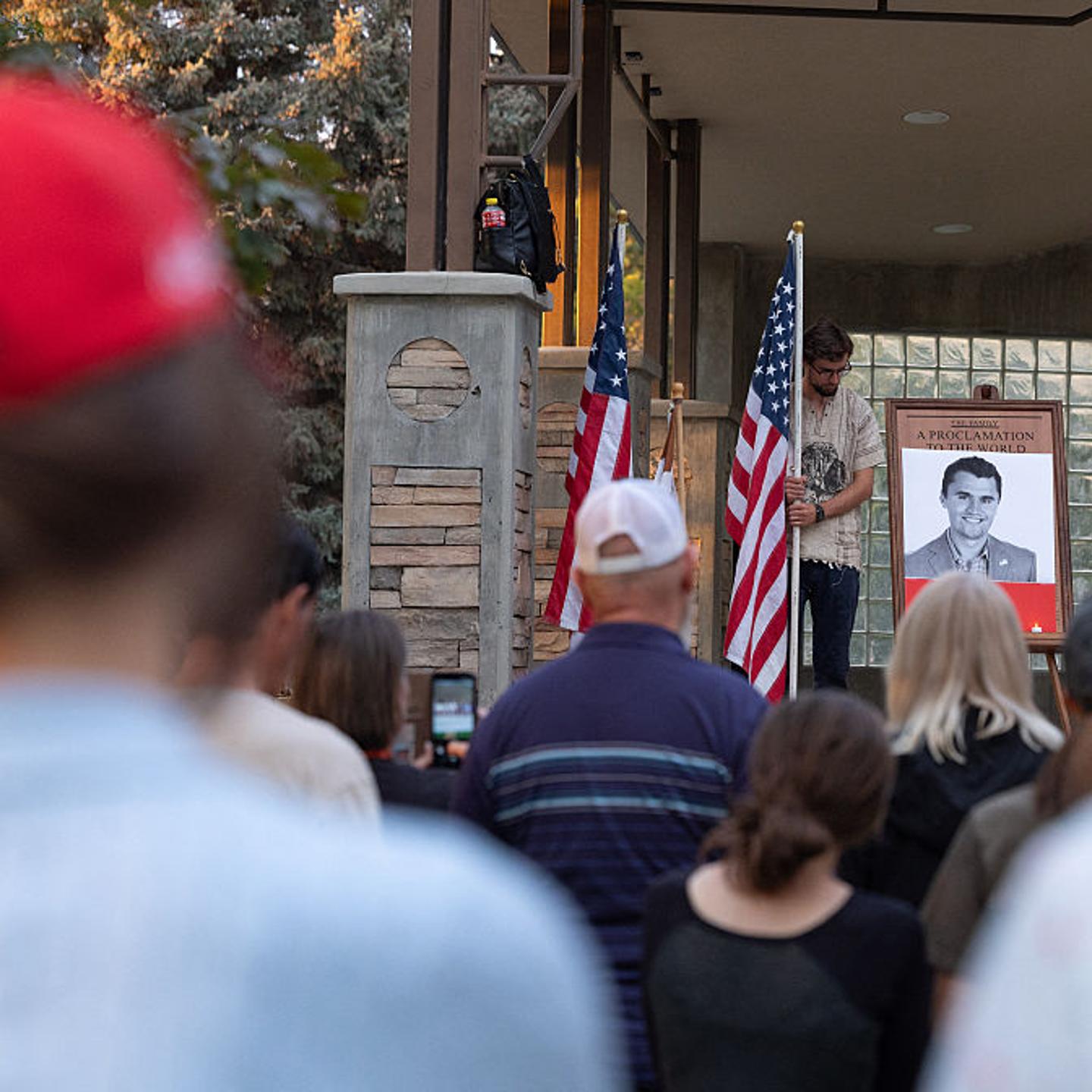People attend a vigil for youth activist and influencer Charlie Kirk, who was shot at a public event at Utah Valley University, in Orem City Center Park, Orem, Utah, on Sept. 10, 2025.