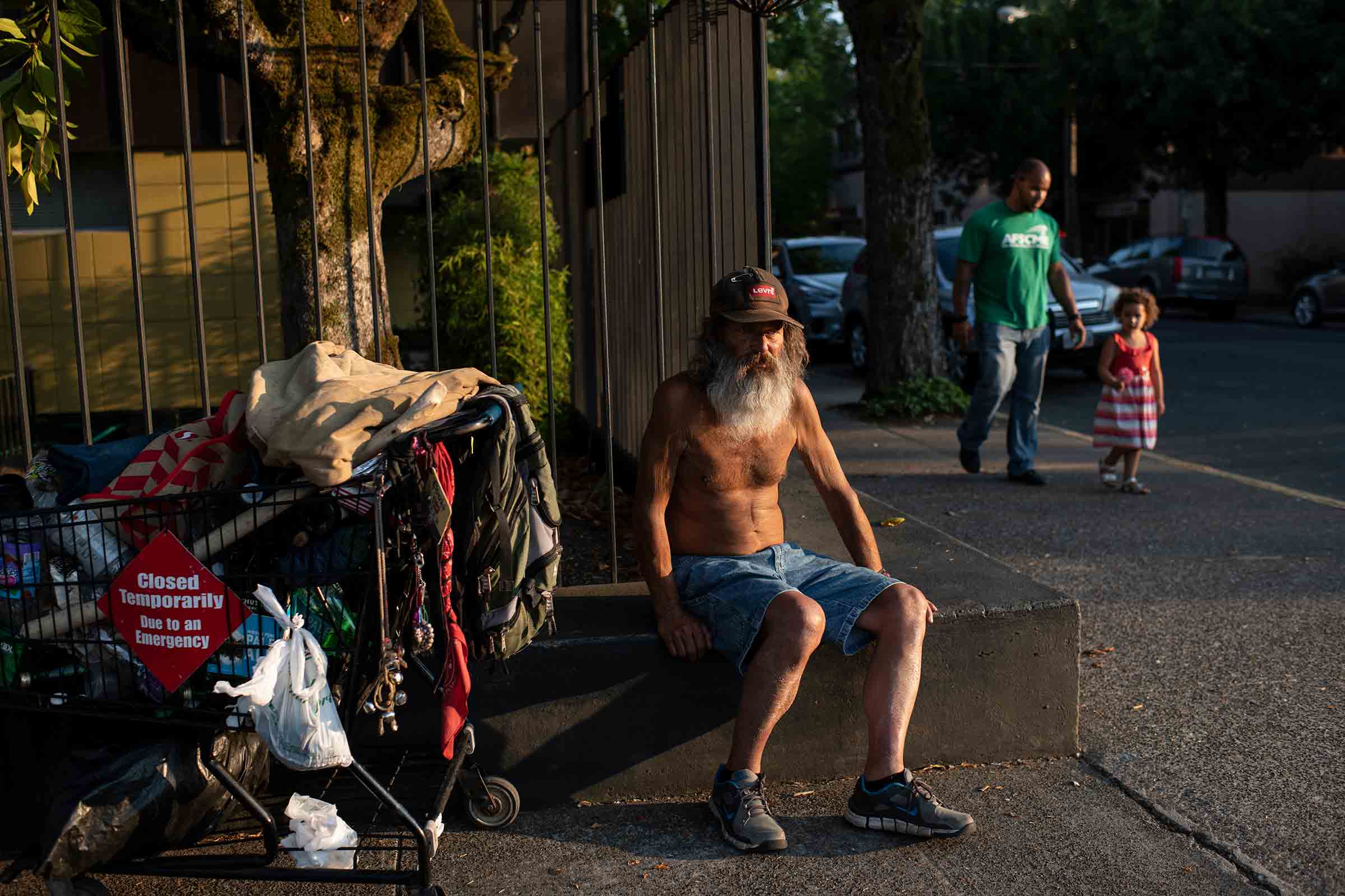 Stepp prepares to bed down in his regular spot in downtown McMinnville, Ore., on Aug. 7, 2018