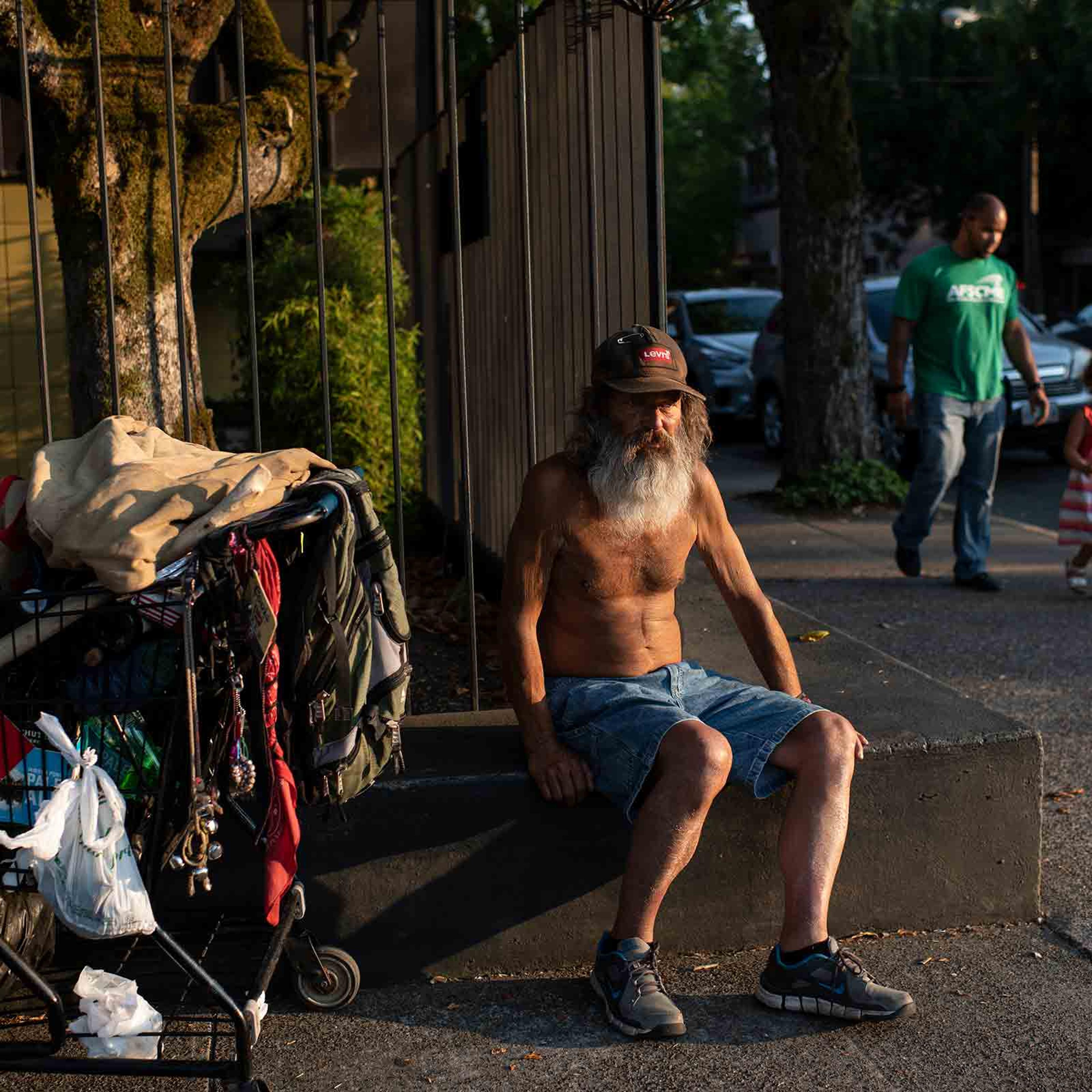 Stepp prepares to bed down in his regular spot in downtown McMinnville, Ore., on Aug. 7, 2018